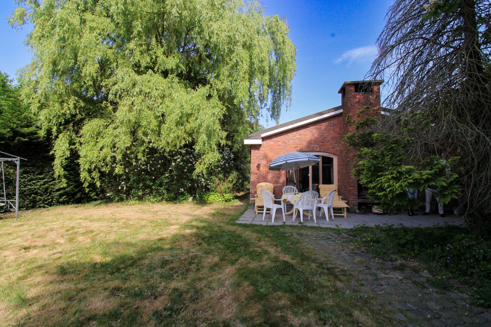 Luxe, ruimte en ontspanning onder één dak – exclusieve villa met zwembad en tennisveld te koop in Beveren! foto 39