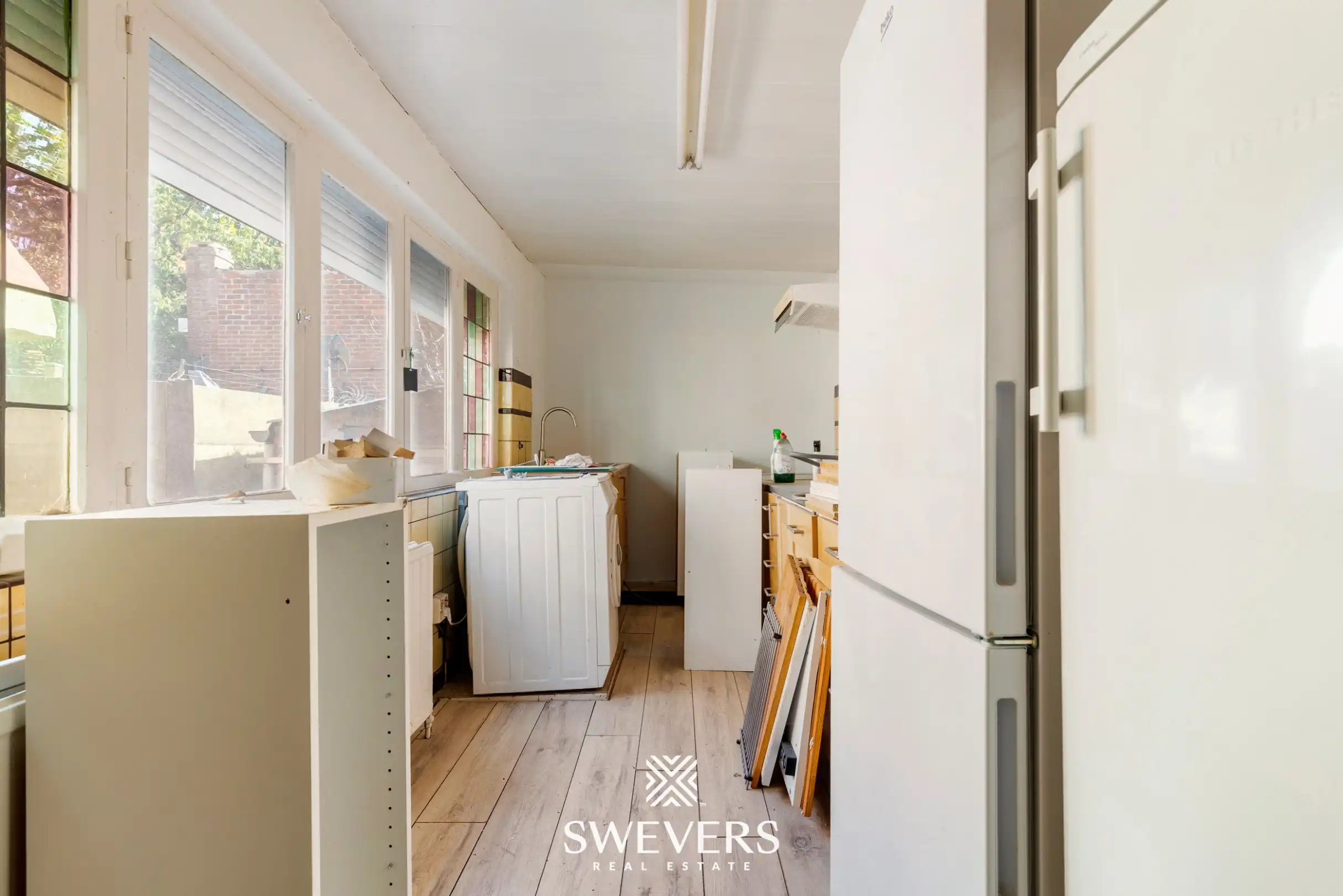 Uitstekend gelegen te renoveren woning met 3 slaapkamers foto 5