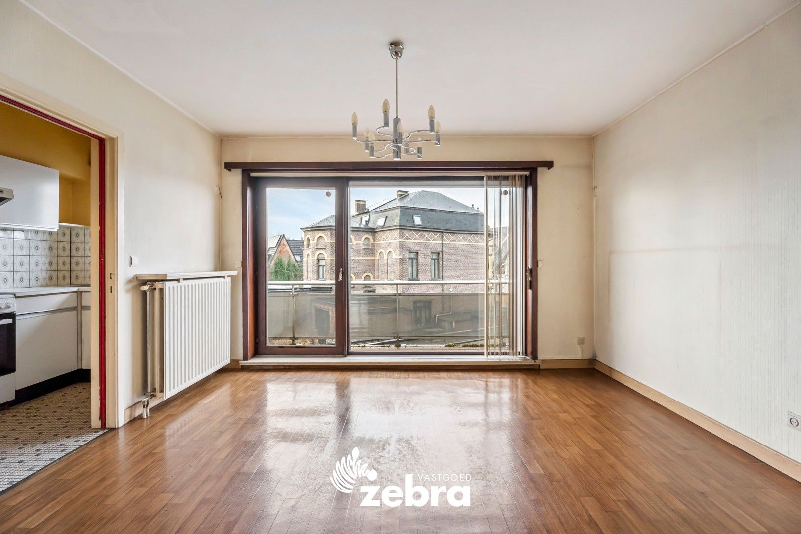 Licht op te frissen appartement met 2 slaapkamers op wandelafstand van centrum Roeselare! foto 2