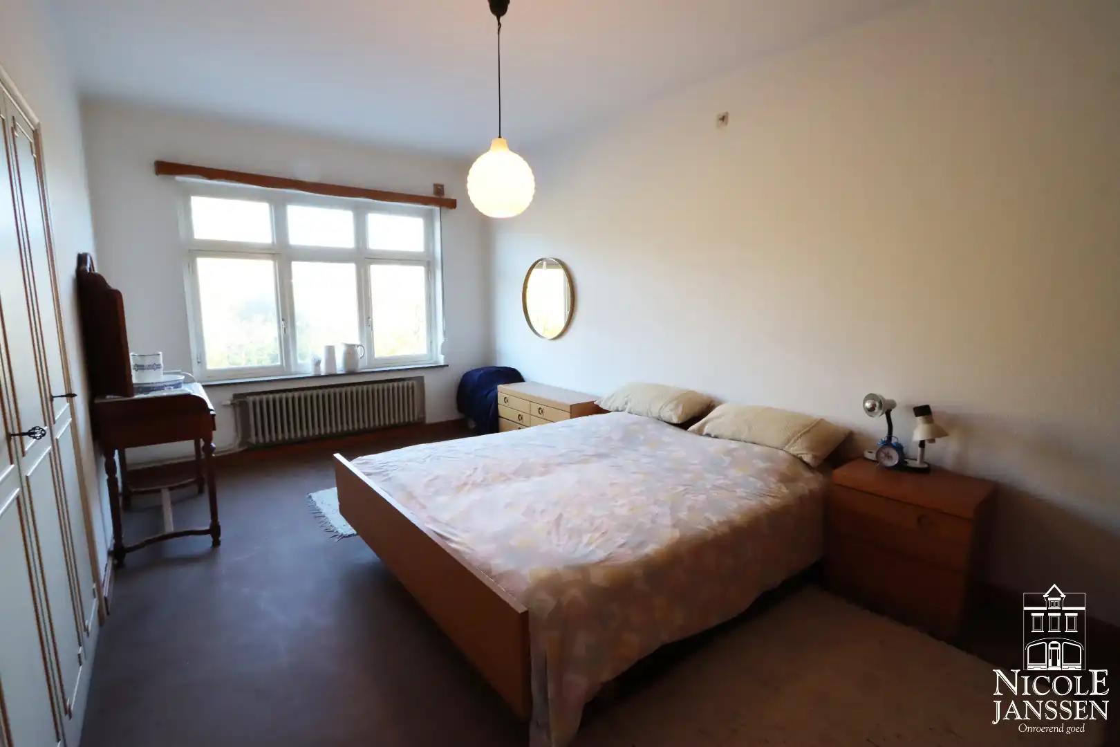 Op te frissen stadswoning met zes slaapkamers en gezellige stadstuin foto 8