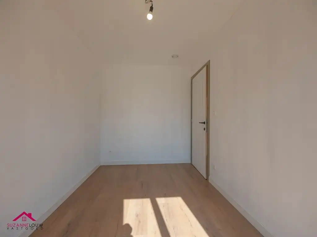 Gelijkvloers appartement met ruim terras foto 12