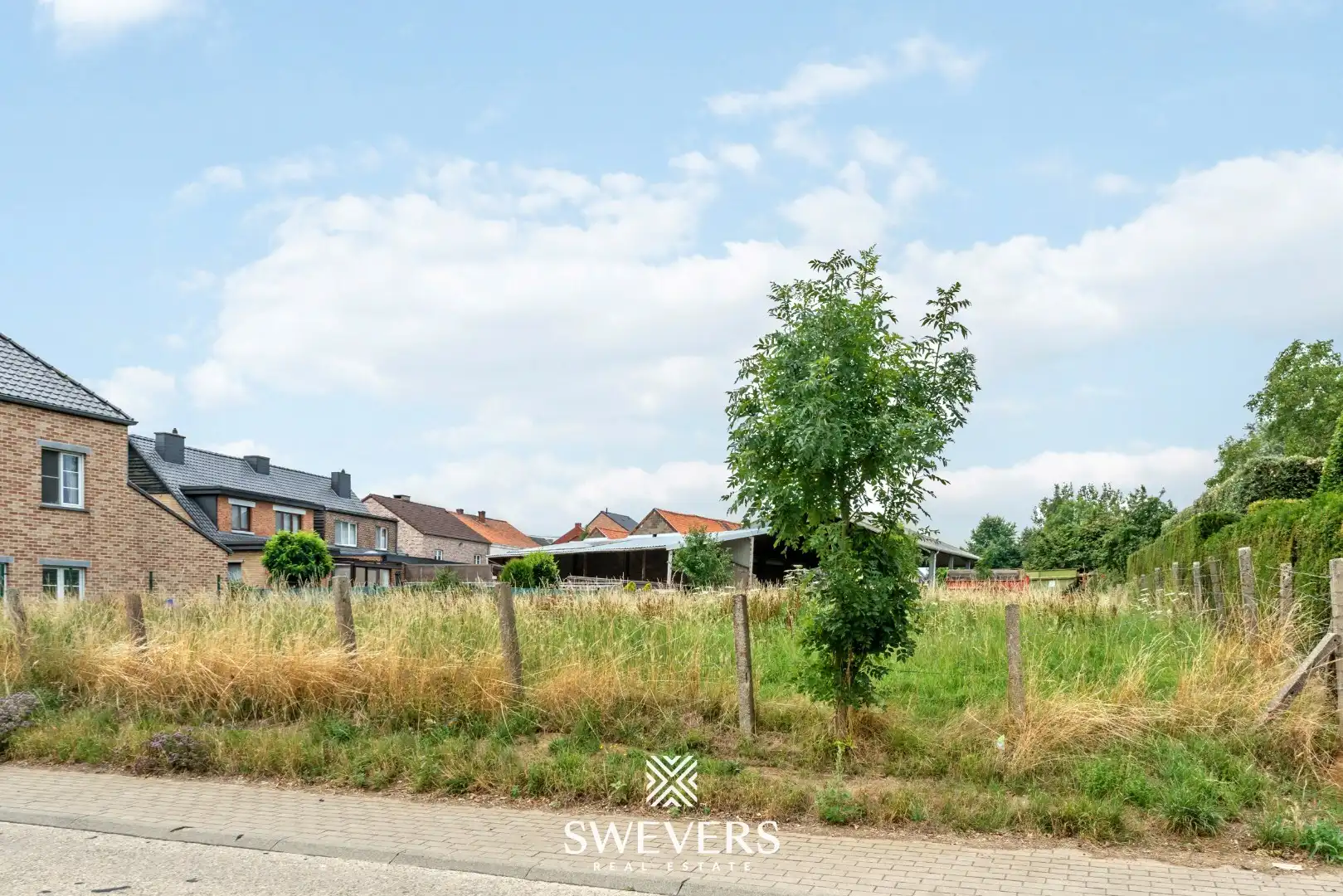 Bouwgrond voor halfopen bebouwing in hartje Riemst foto 11