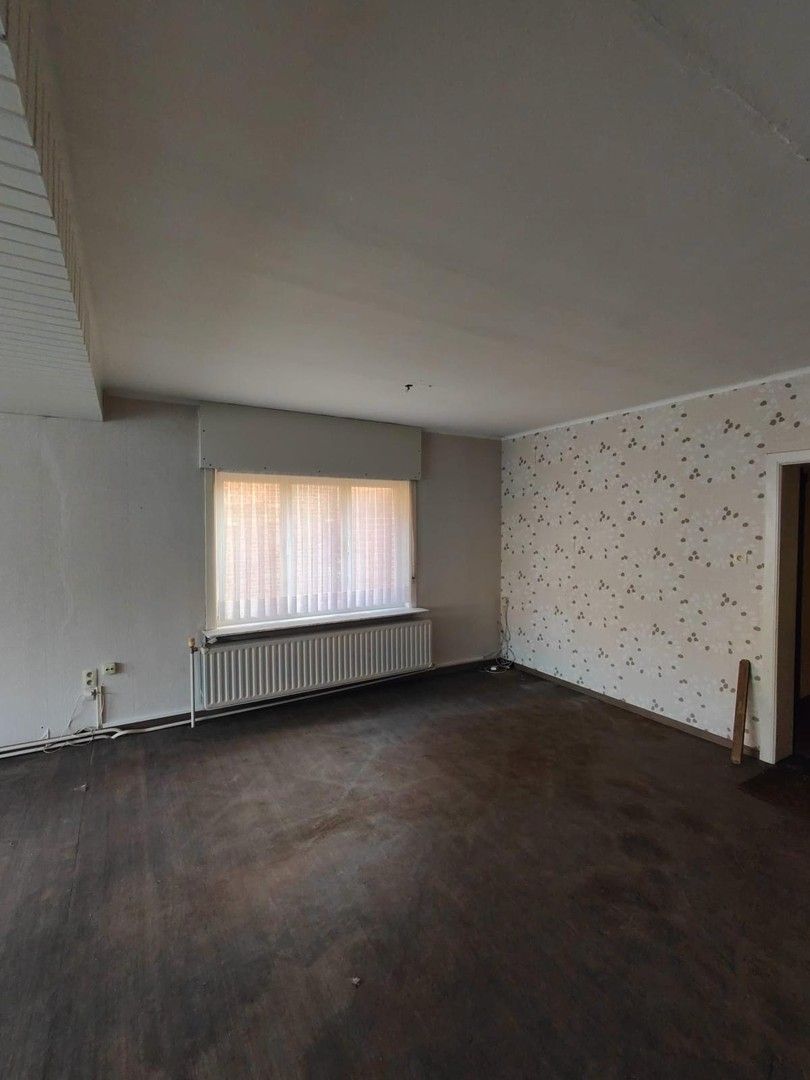 Woning met loods en voormalige showroom foto 8