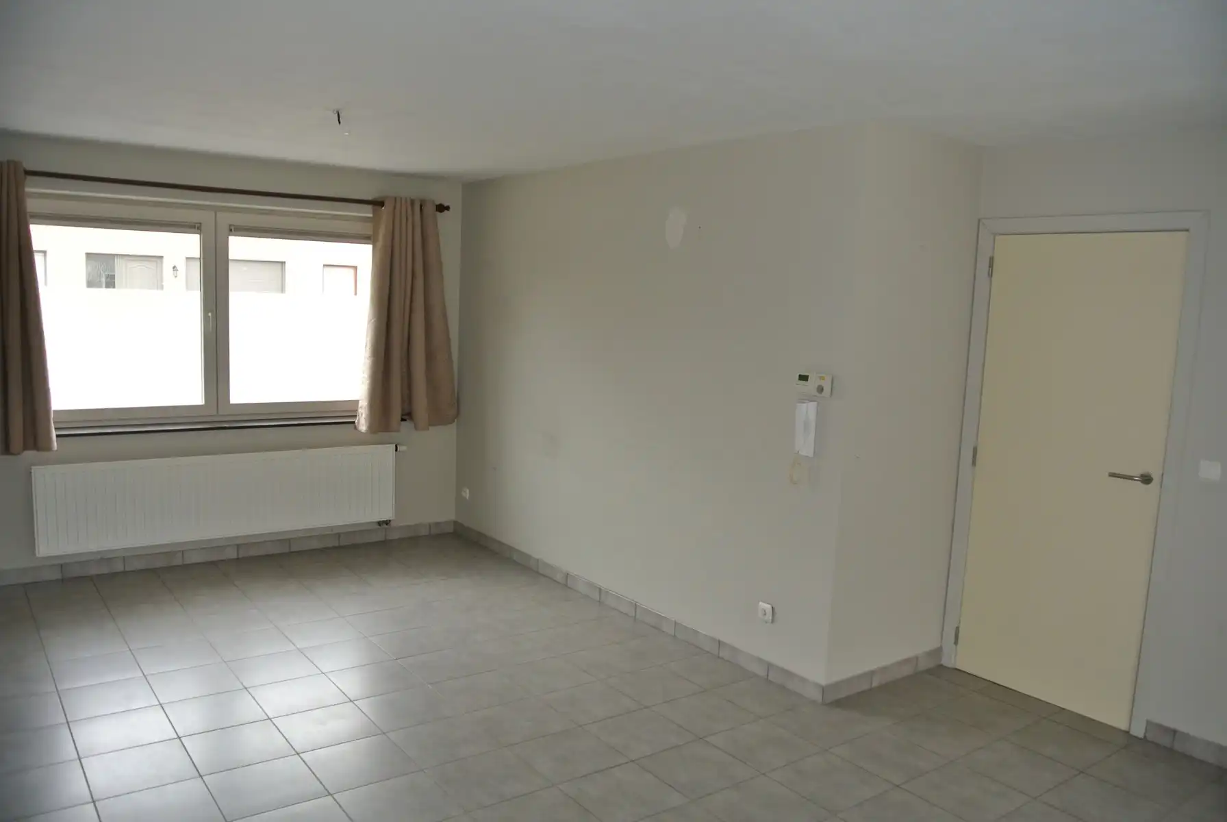 Gezellige gelijkvloers appartement  met 2 slaapkamers + terras en tuintje foto 2