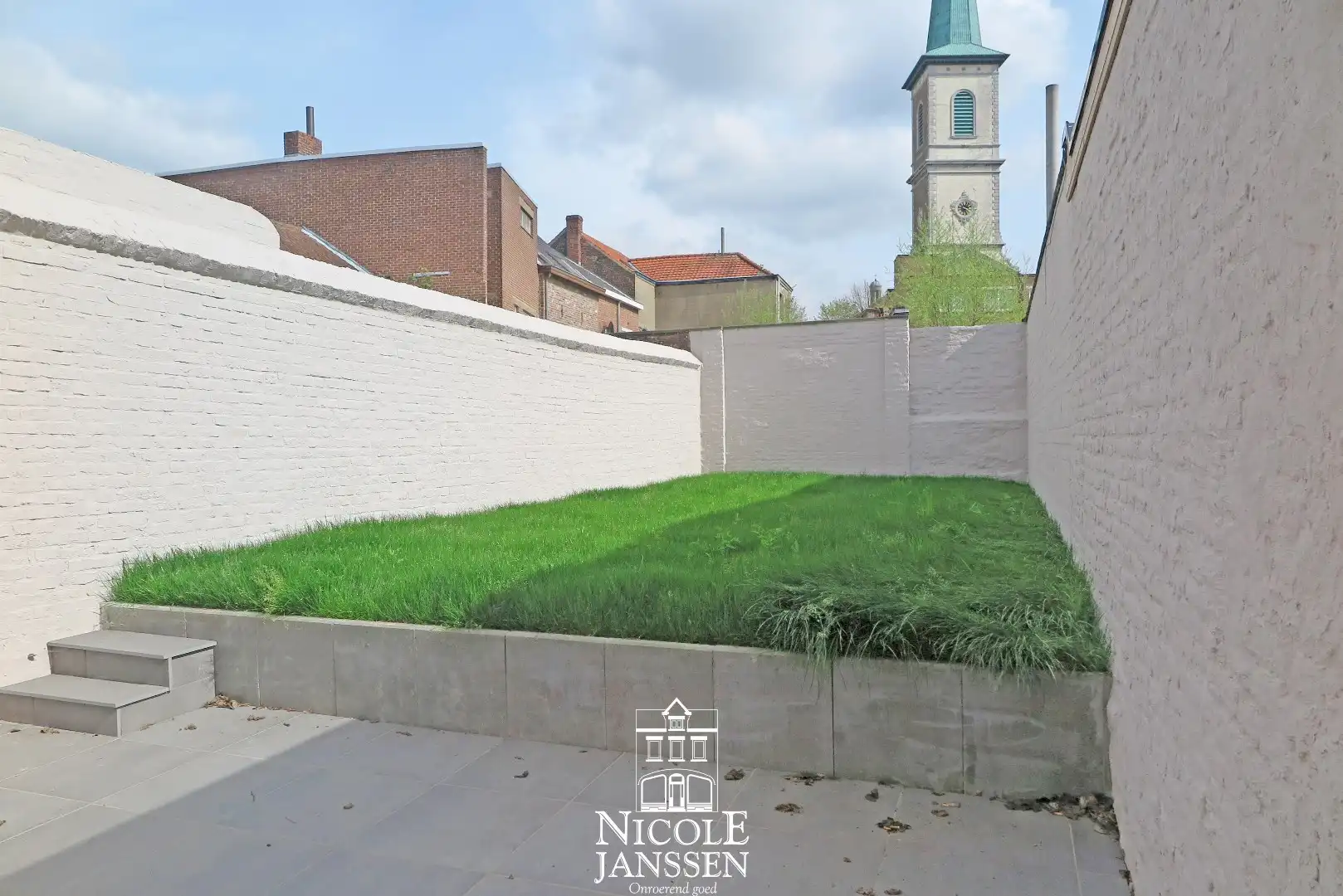 Mooi, gelijkvloers appartement met terras en tuin foto 16