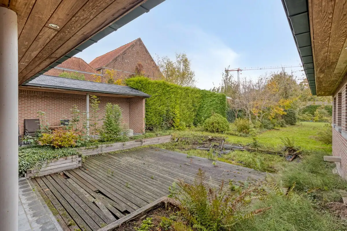 Bijzonder ruime woning met inpandige garage en 3 slks op een perceel van 1218 m². foto 17