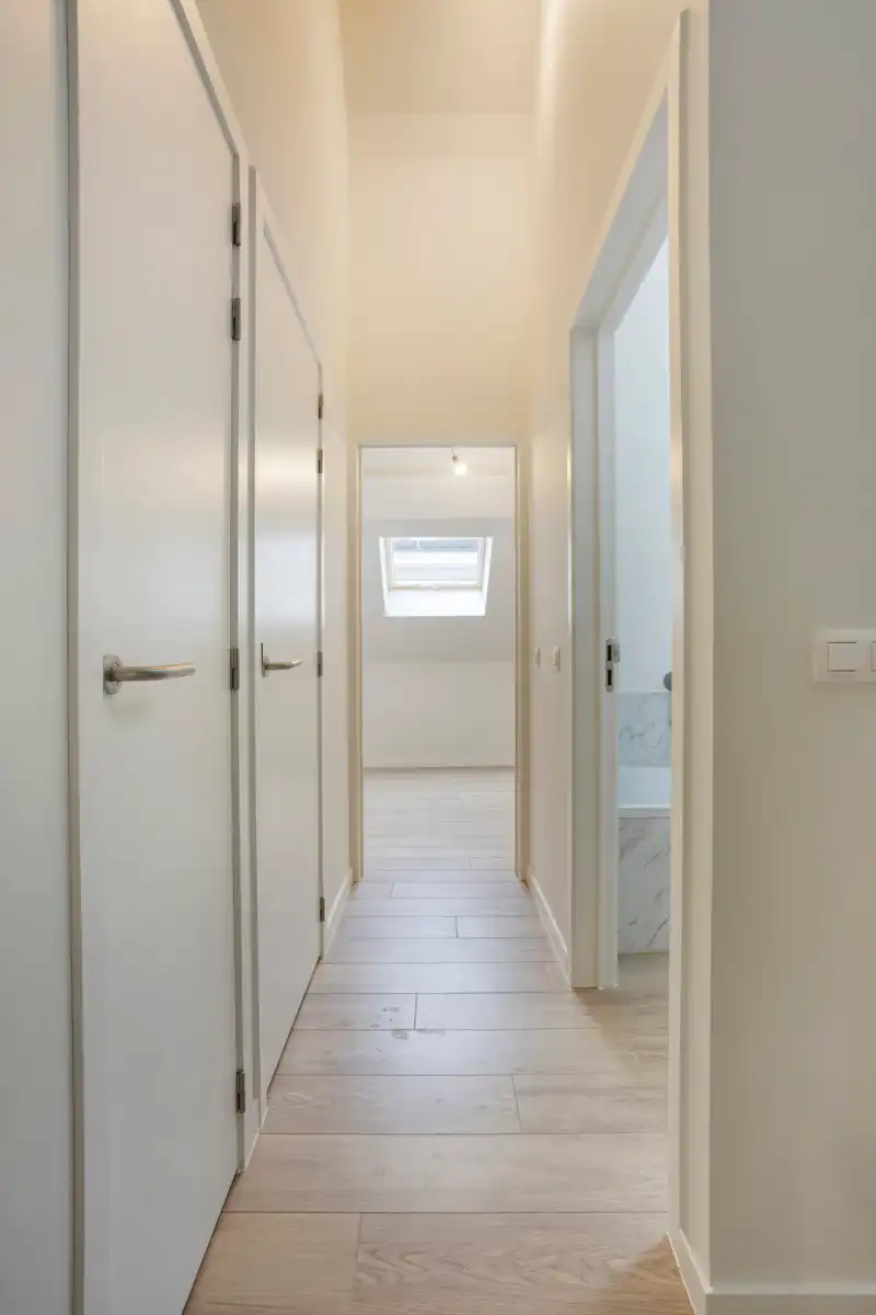 Stijlvol gerenoveerd duplex-appartement met terras foto 19