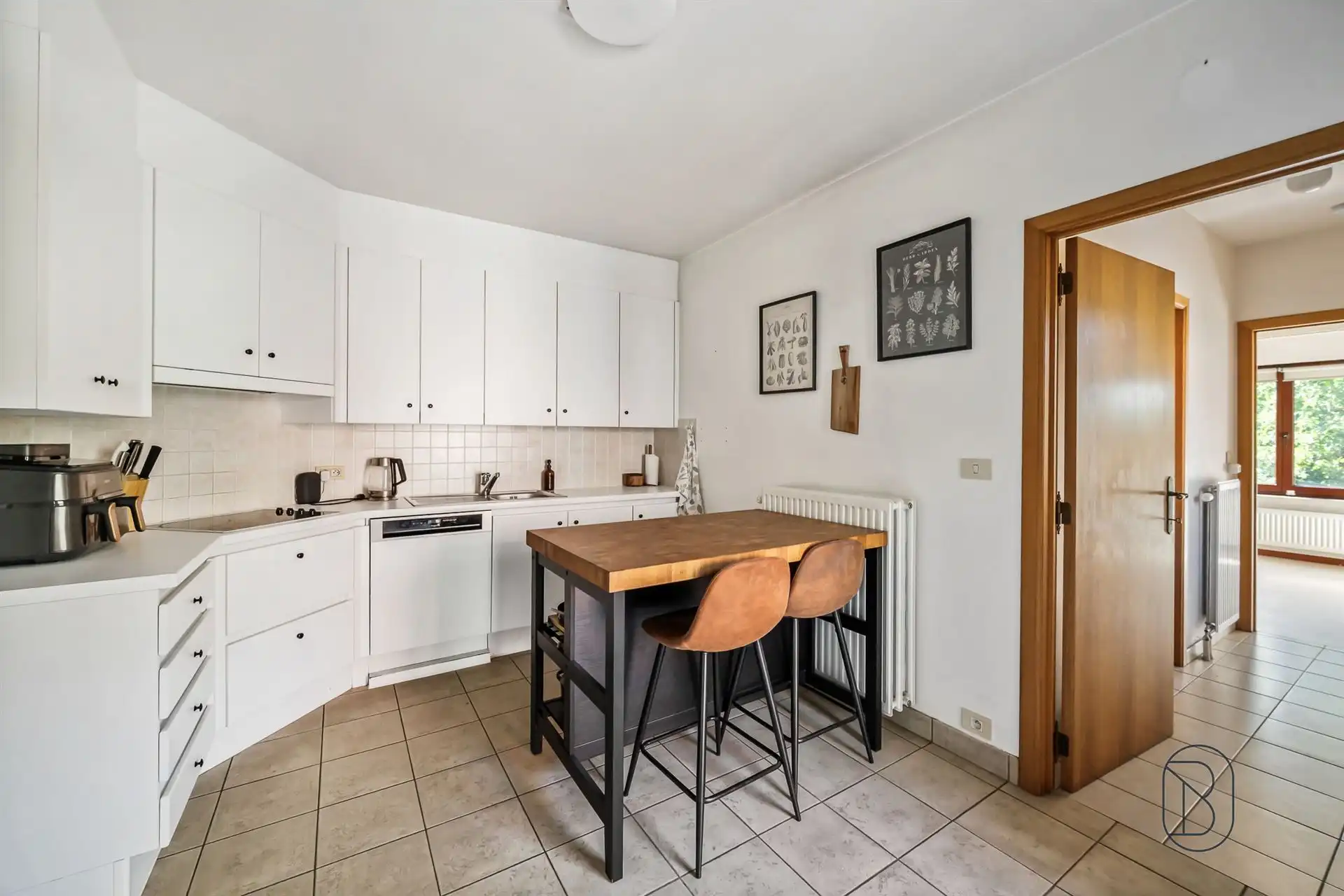Instapklare woning met grote aangename tuin.  foto 8