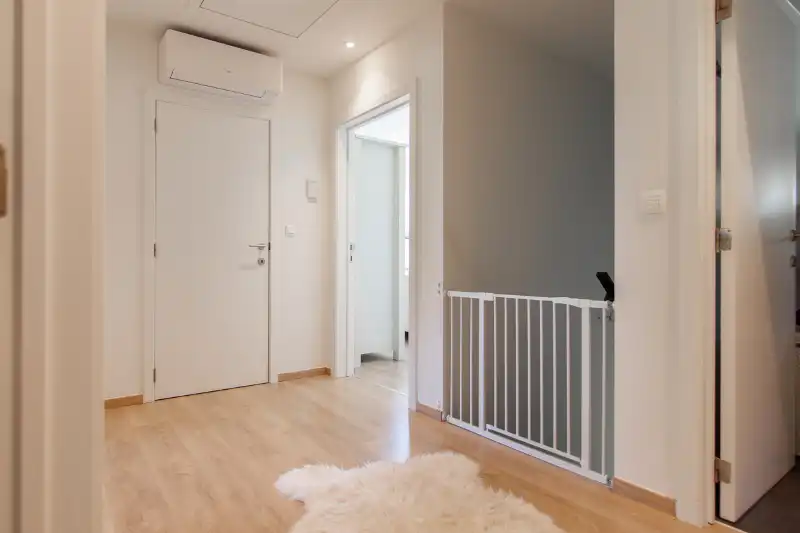 Moderne en energiezuinige woning met volledige onderkeldering gelegen op een residentieel en rustig perceel&nbsp;van 14 aren 45 centiaren nabij de scholen en het centrum van Genk foto 15