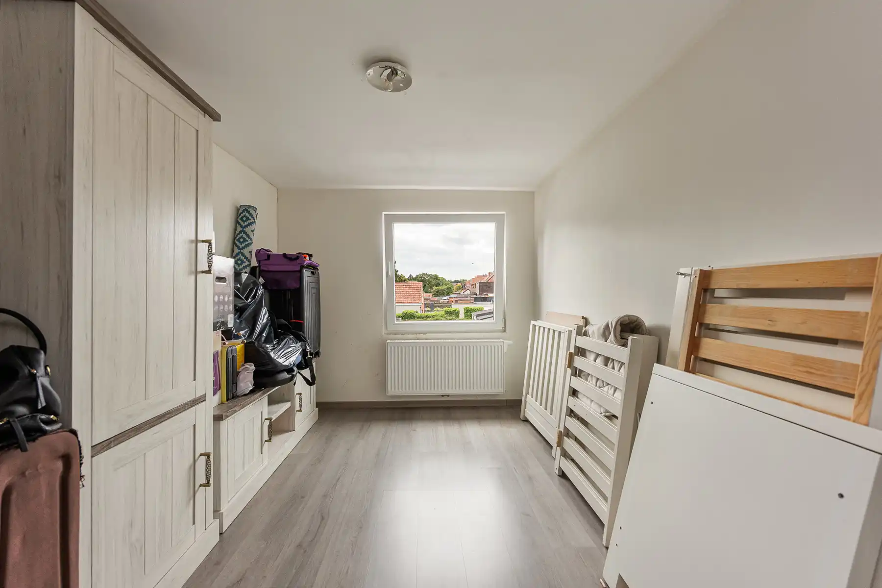 Gezinswoning met 3 slaapkamers en stadskoer met toegangspoort, gelegen binnen de ring van Turnhout. foto 12