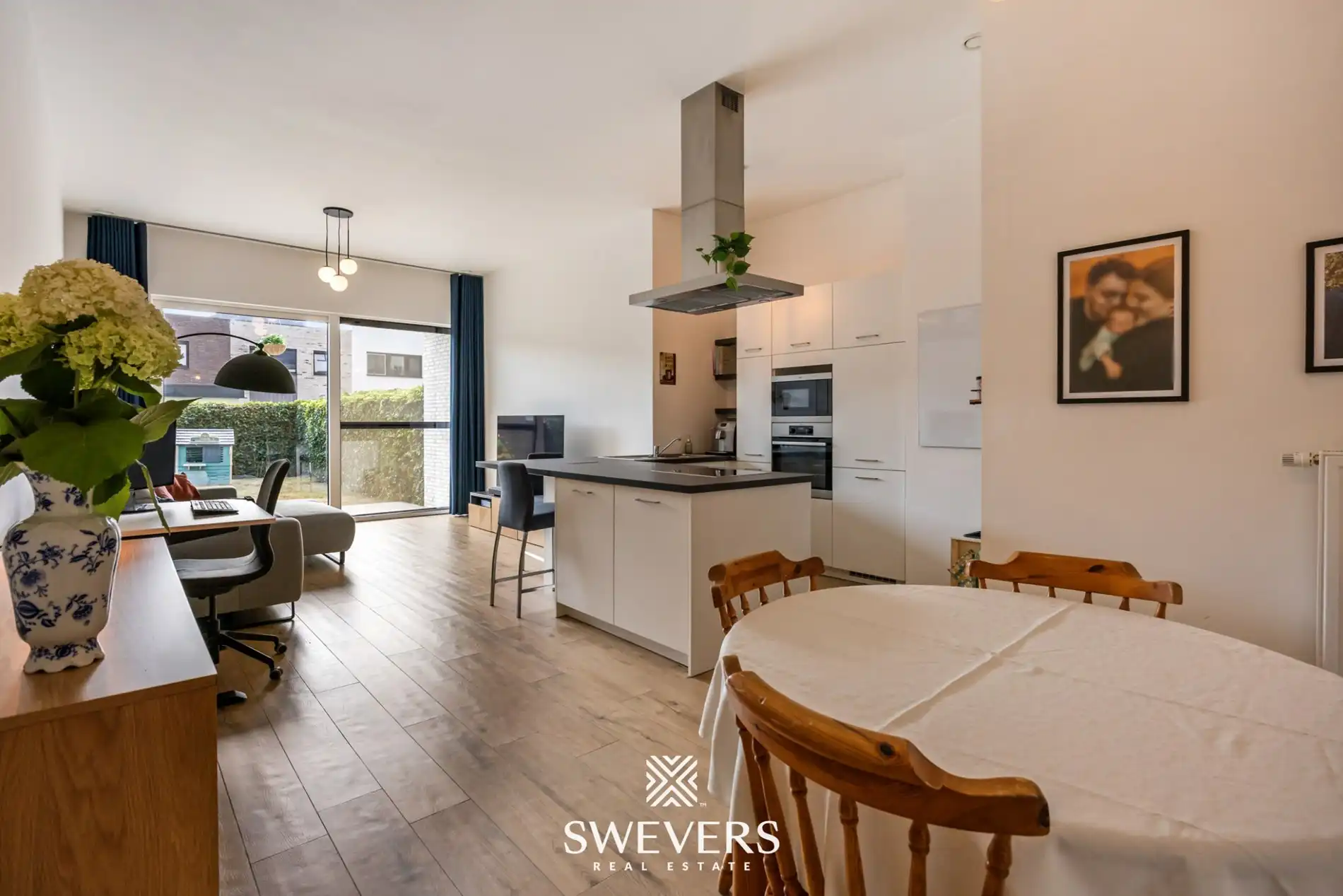 Recent en ruim gelijkvloers 3 slpk appartement met tuin en autostaanplaats nabij centrum Hasselt foto 6