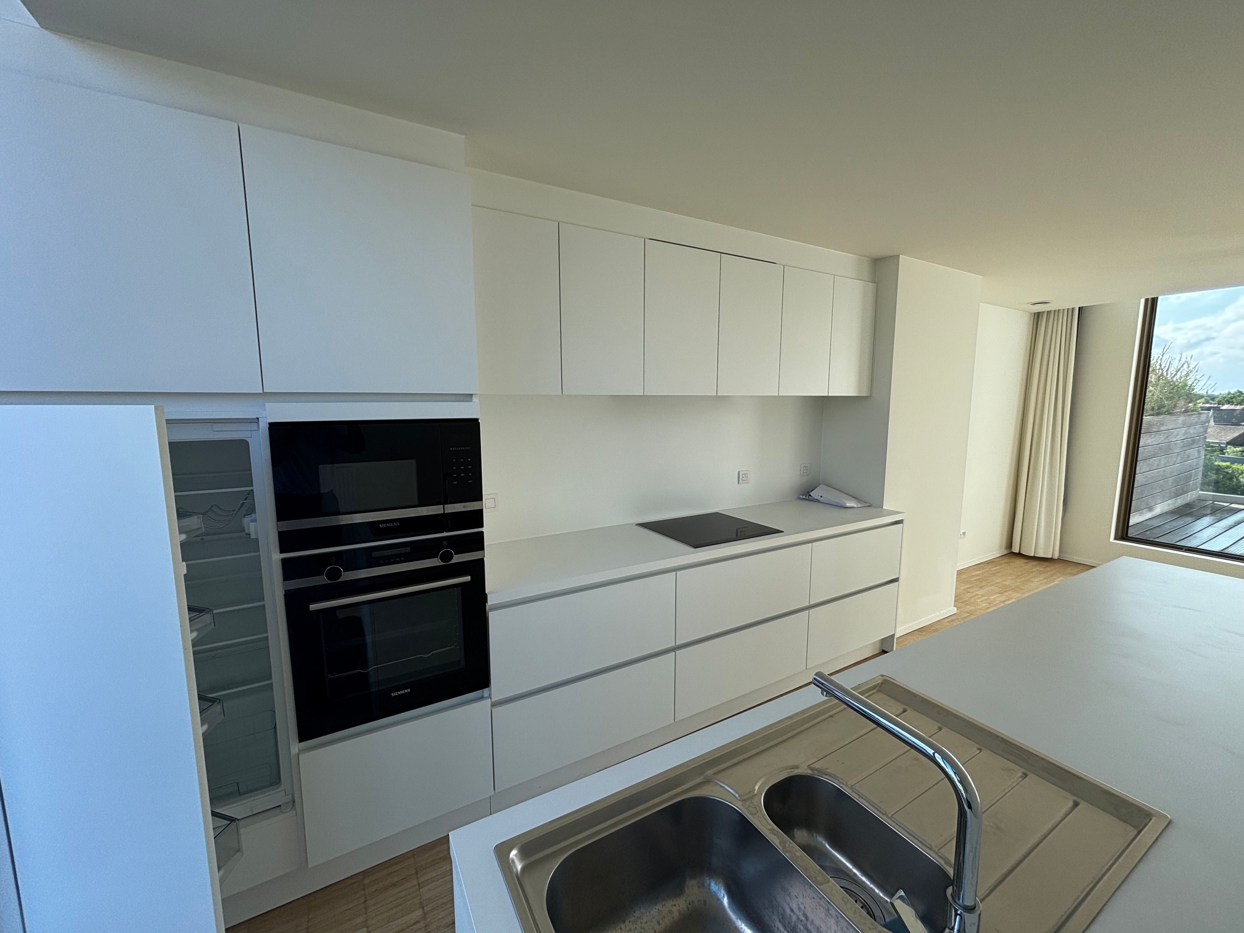 Lichtrijke, moderne en energiezuinige penthouse te koop in Roeselare foto 5