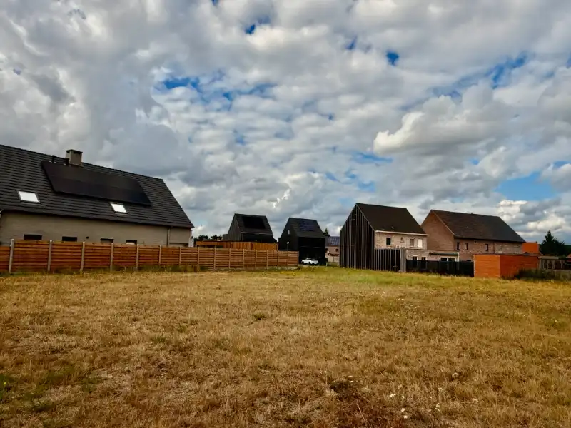 Bouwgrond in een recente verkaveling in een doodlopende straat vlakbij het centrum van Ravels foto 3