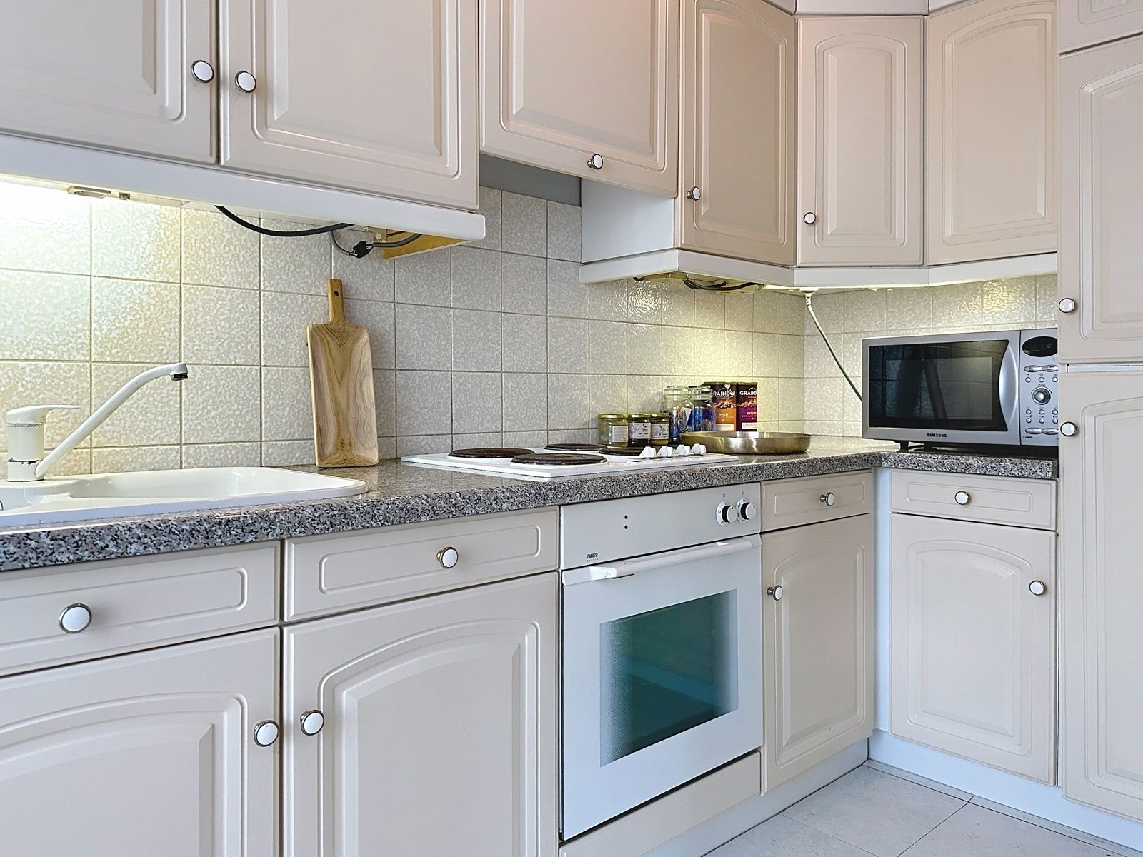 Gelijkvloersappartement met tuin en garagebox in rustige woonwijk te Schelle foto 12