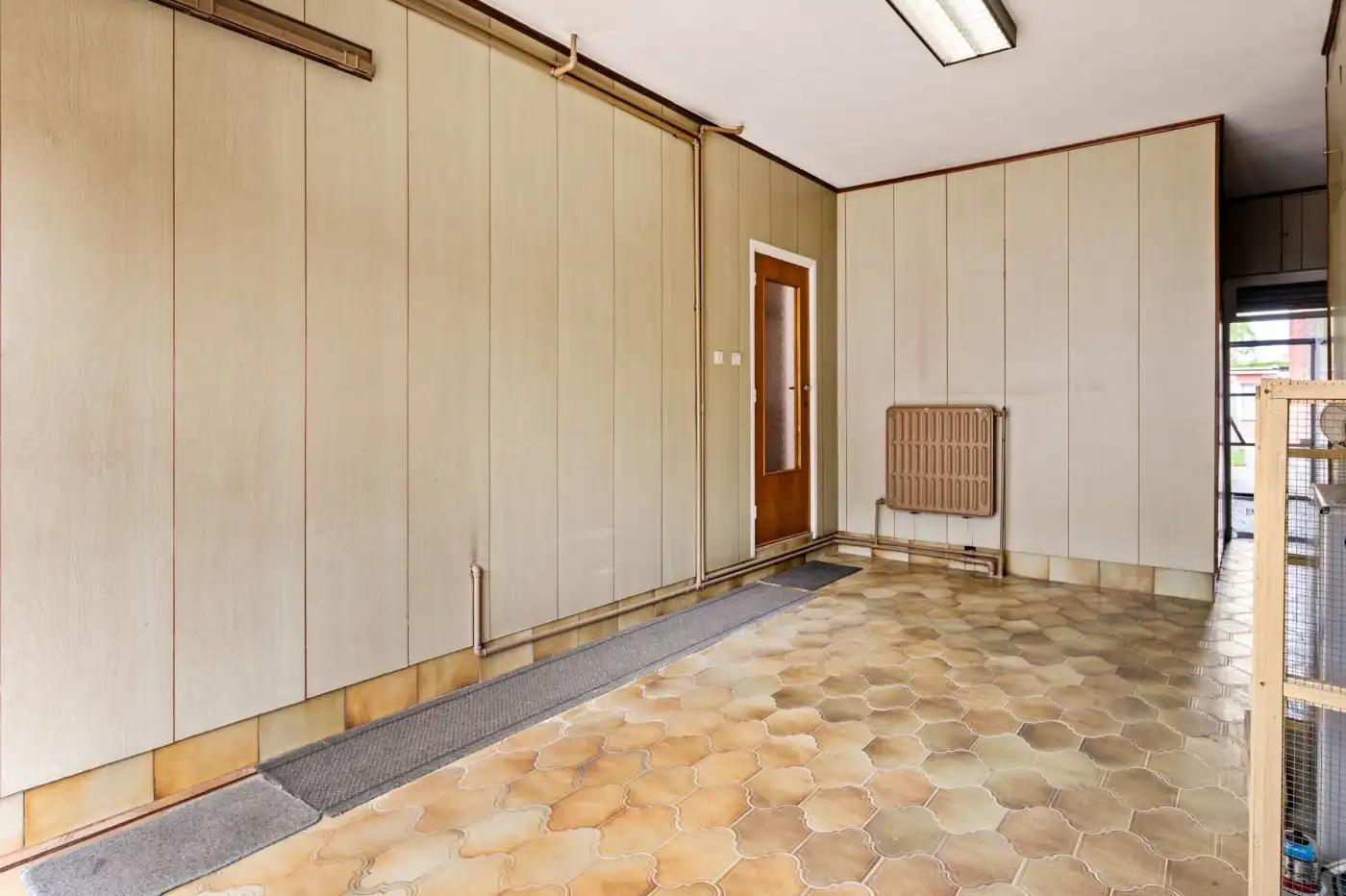 Te renoveren woning met 2 slpk., dubbele garage en tuin foto 19