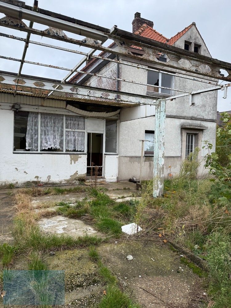 Te koop – Te renoveren halfopen woning met 3 slaapkamers en tuin in Zwartberg (Genk) foto 4