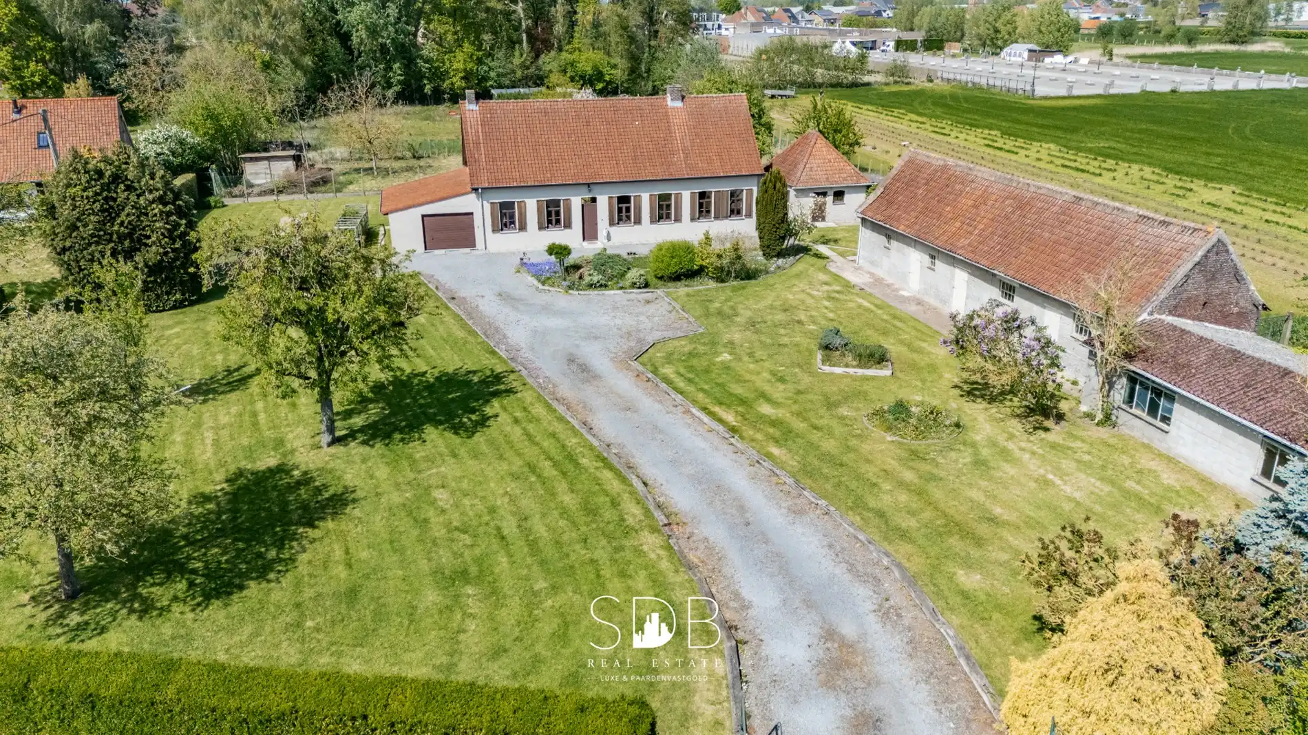 Authentieke hoeve met bijgebouwen en graslanden op 6.664m² met mogelijkheid tot bijkomend grasland op 3.070m² foto 4