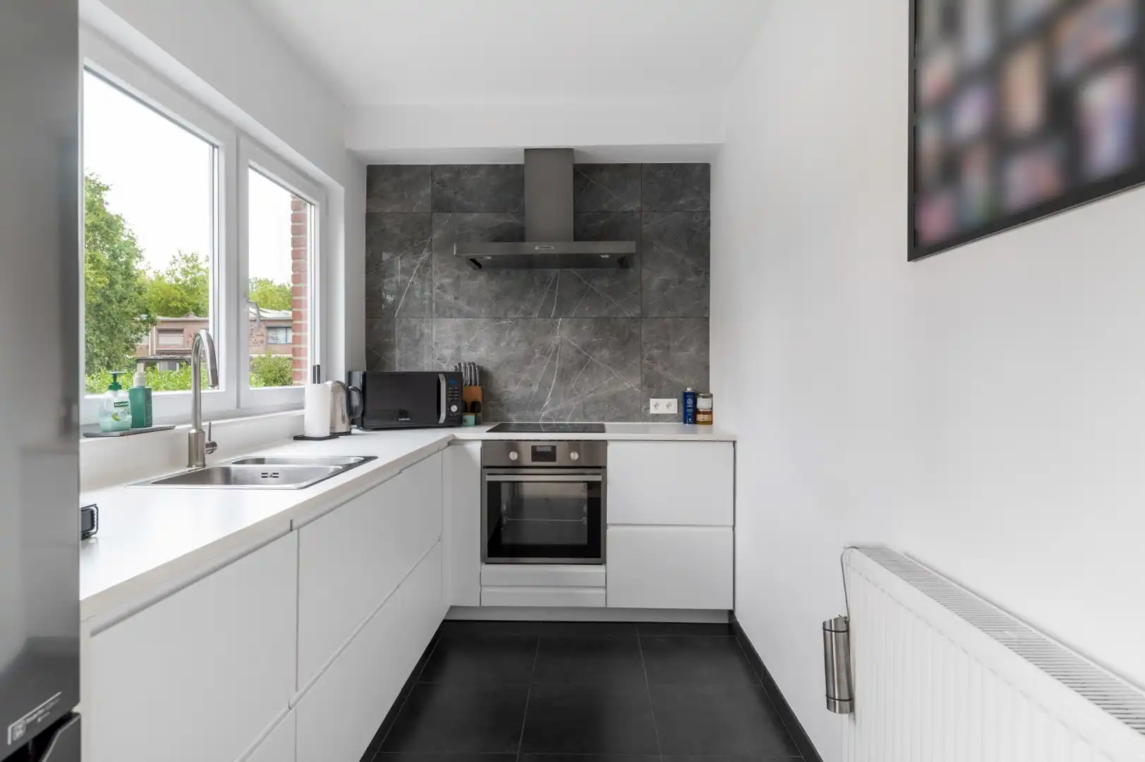 Instapklare gezinswoning met 4 slaapkamers, praktijkruimte en A-label! foto 9