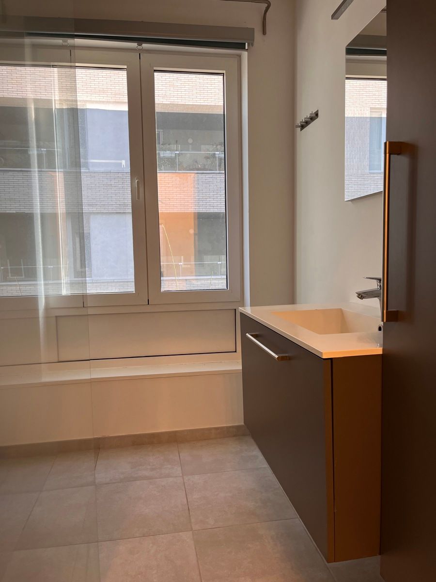 Gelijkvloers appartement te huur + garage foto 9