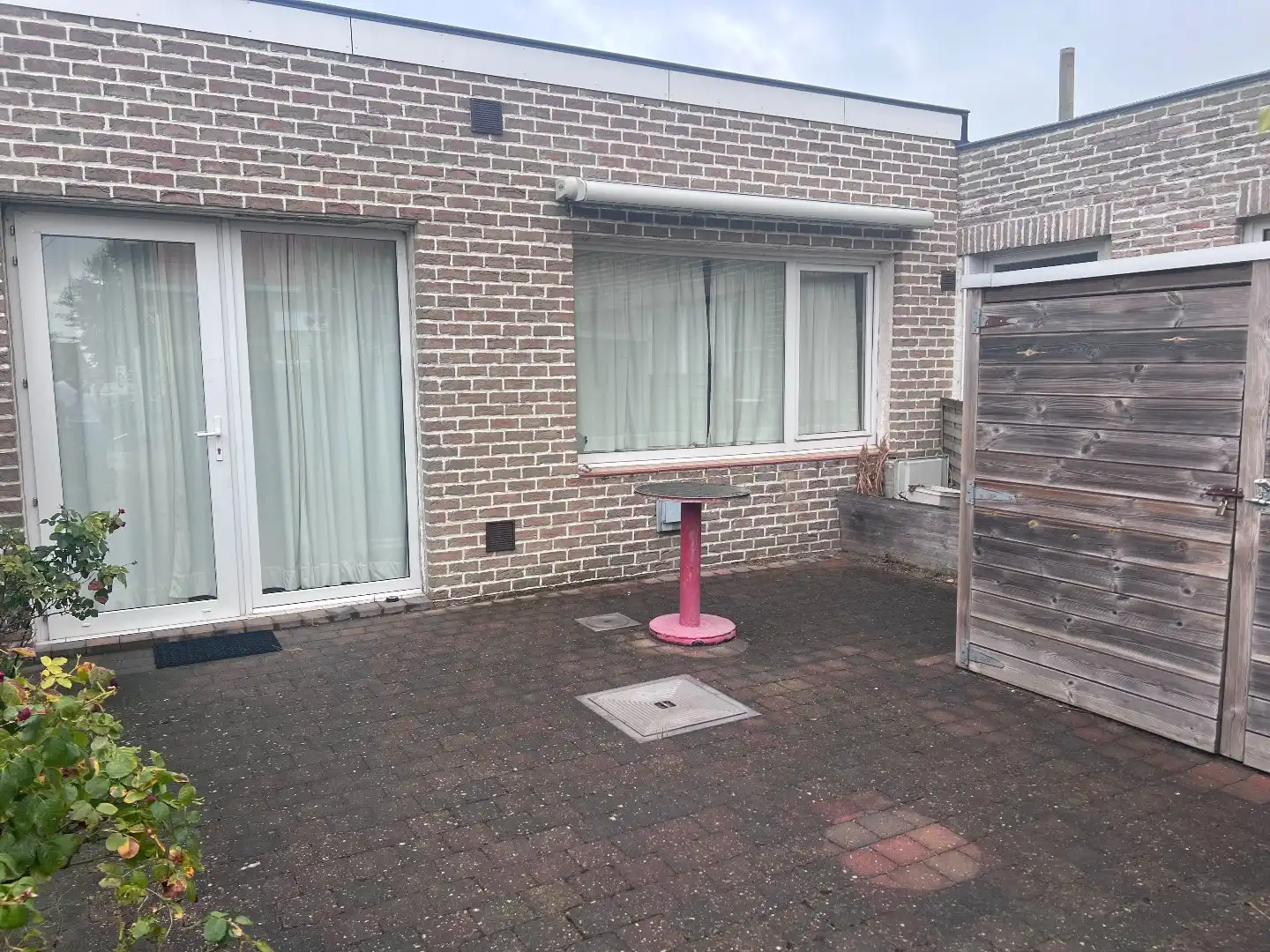 Woning met gezellig tuintje en privatieve staanplaats te huur in De Haan! foto 2
