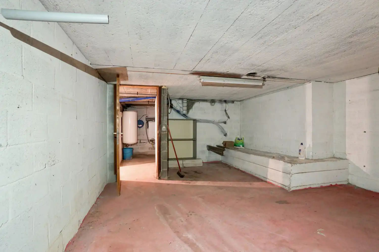 Gelijkvloers appartement met 2 slaapkamers, een ruim terras, 2 autostaanplaatsen, een kelder en een tuin grenzend aan de Vijvers van Bellefroid te Leuven! foto 17