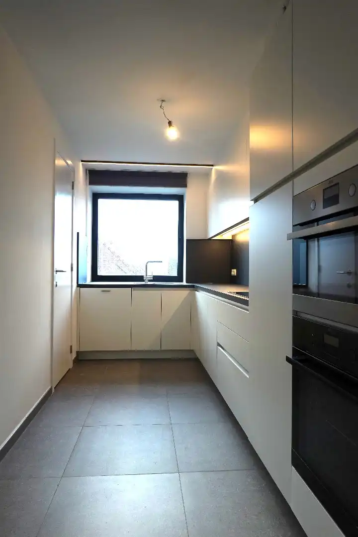 Prachtig 3-slaapkamerappartement met staanplaats in het voormalige gemeentehuis van Vleteren foto 2