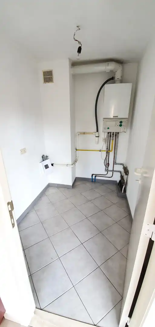Rustig gelegen appartement met terras, garagebox en lift foto 12