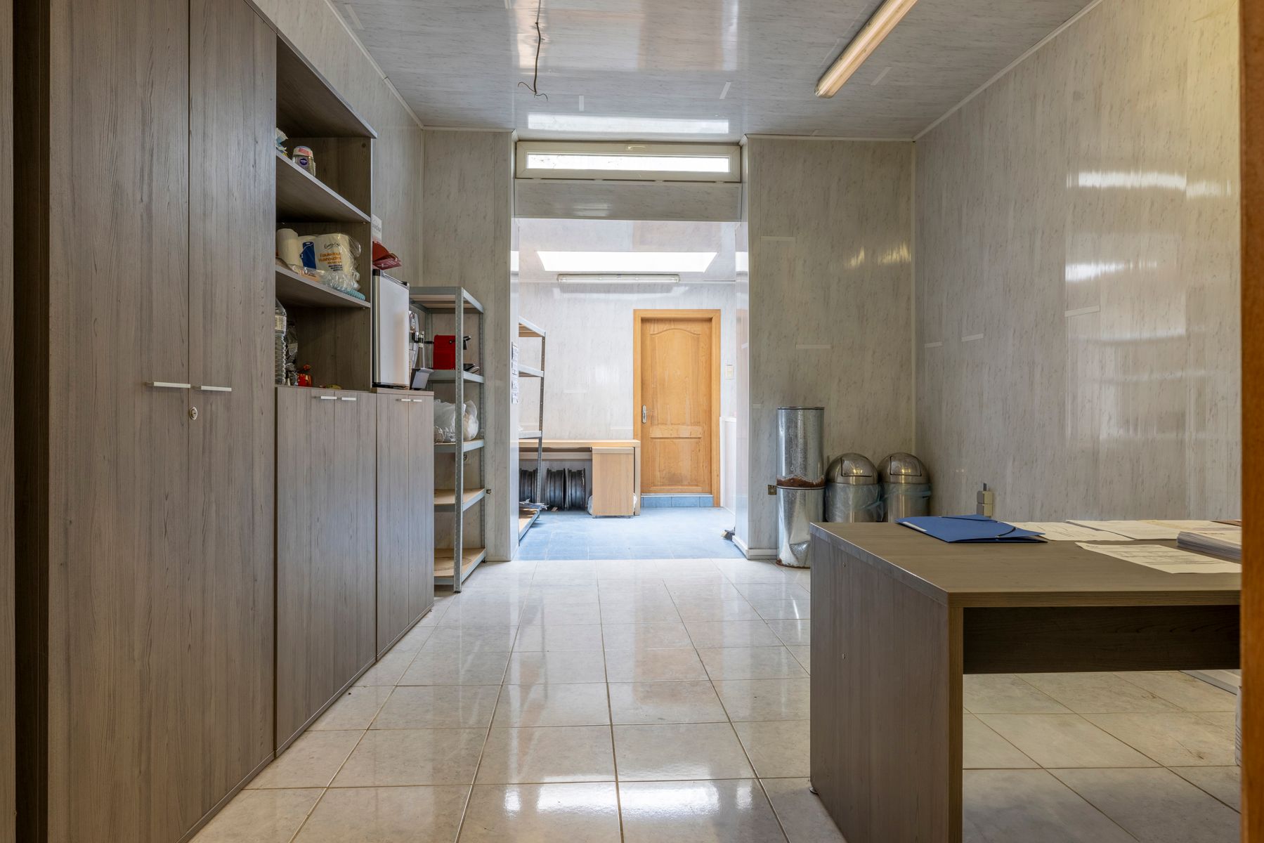Handelsruimte met woning – 5 slaapkamers en stadsterras foto 5