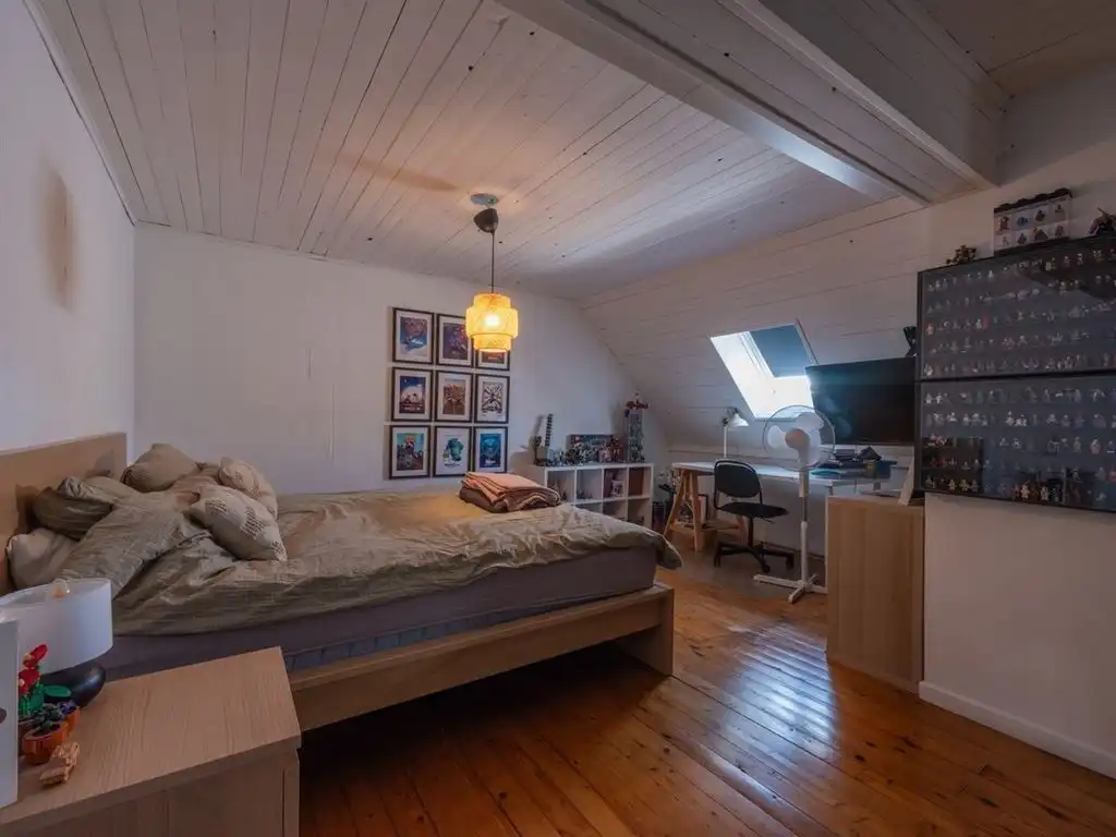 Charmante woning in gesloten bebouwing met ruim terras, tuin en bijhorende carport, volledig onderkelderd met inpandige garage, in het centrum foto 27