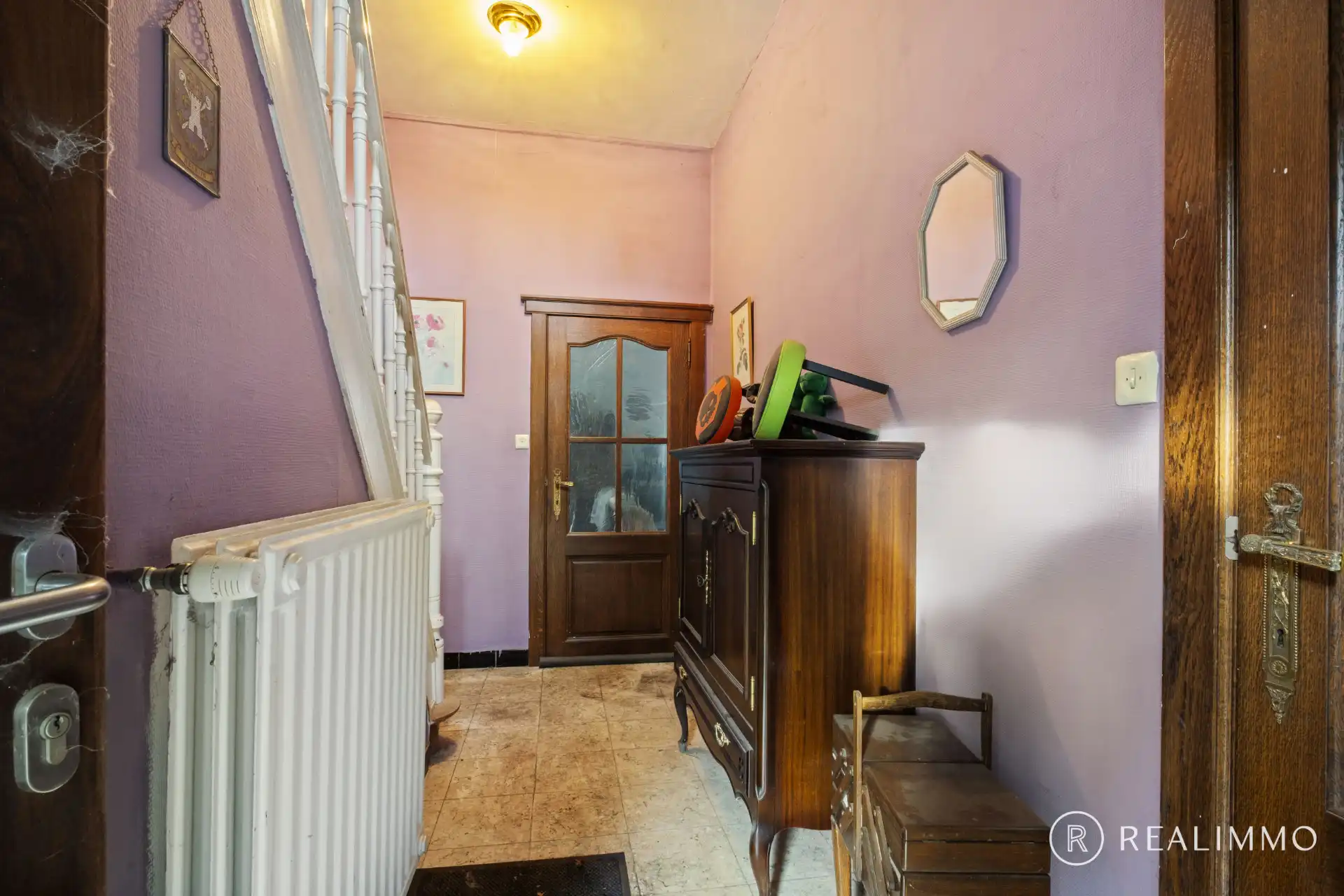 Alleenstaande woning met renovatiepotentieel in het centrum van Helkijn foto 6