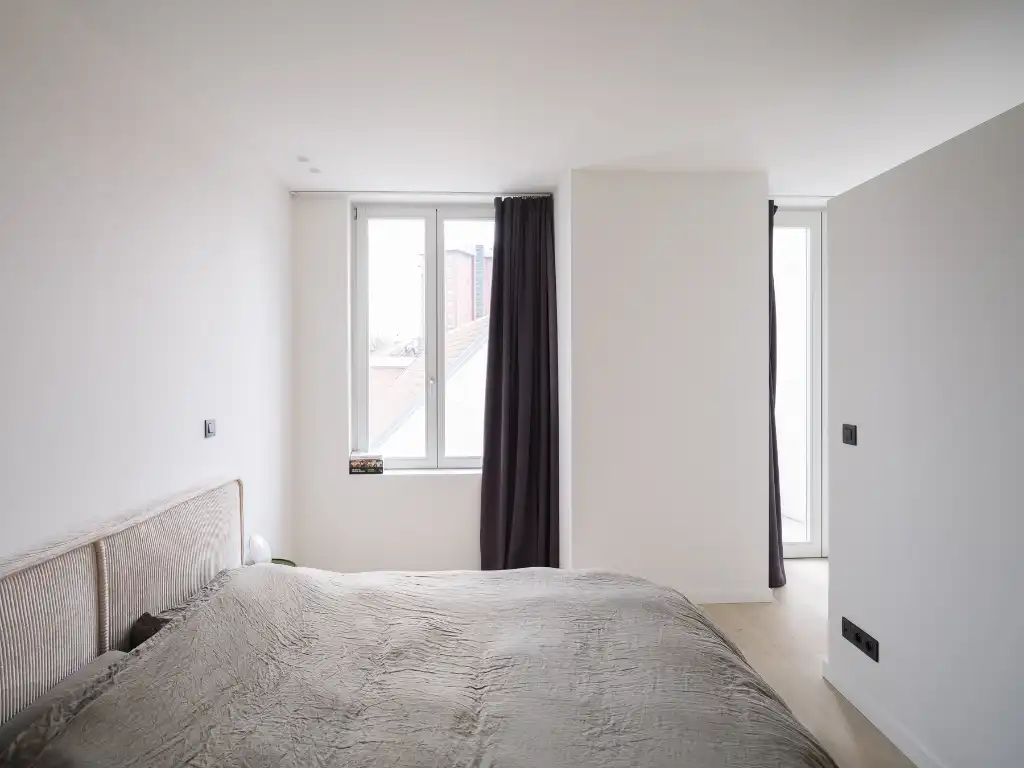 Architecturaal 3-­slaapkamerappartement met twee terrassen in het centrum van Gent. foto 5