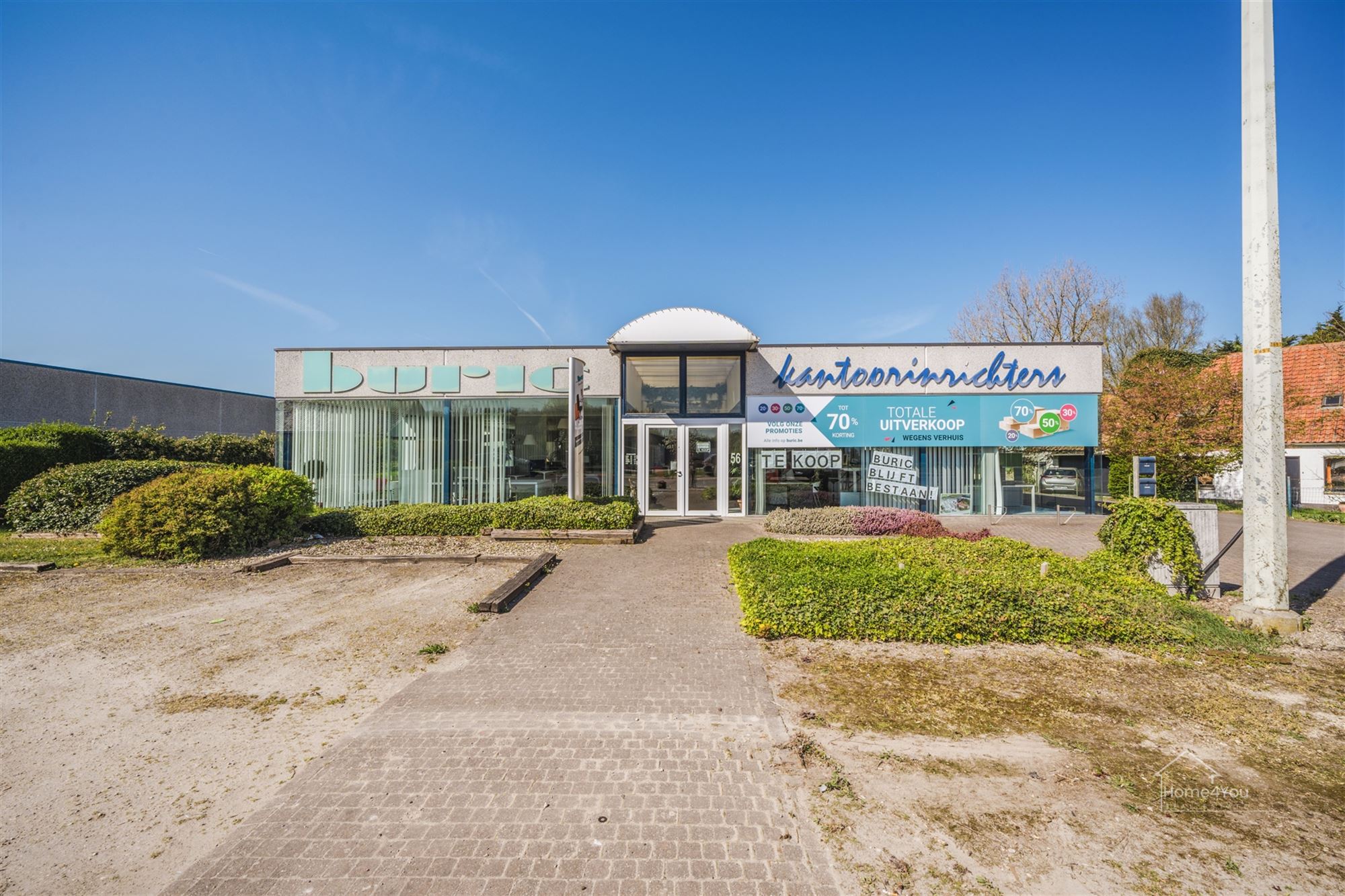  Multifunctioneel bedrijfsgebouw met toonzaal, magazijn, kantoren én woonst op toplocatie. foto 29
