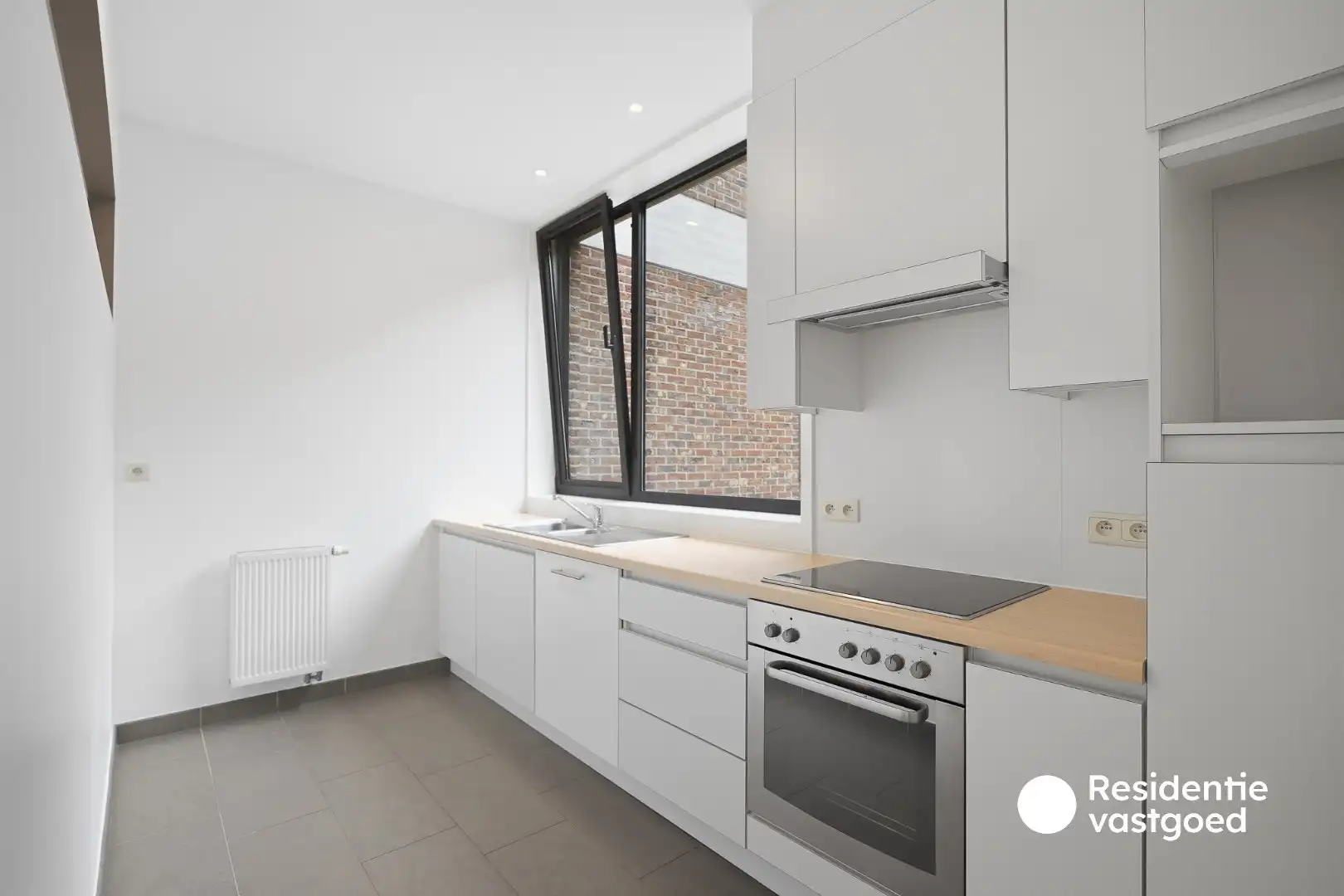 Ruim appartement met staanplaats en terras (46 m²!) aan het Koningin Astridpark foto 5