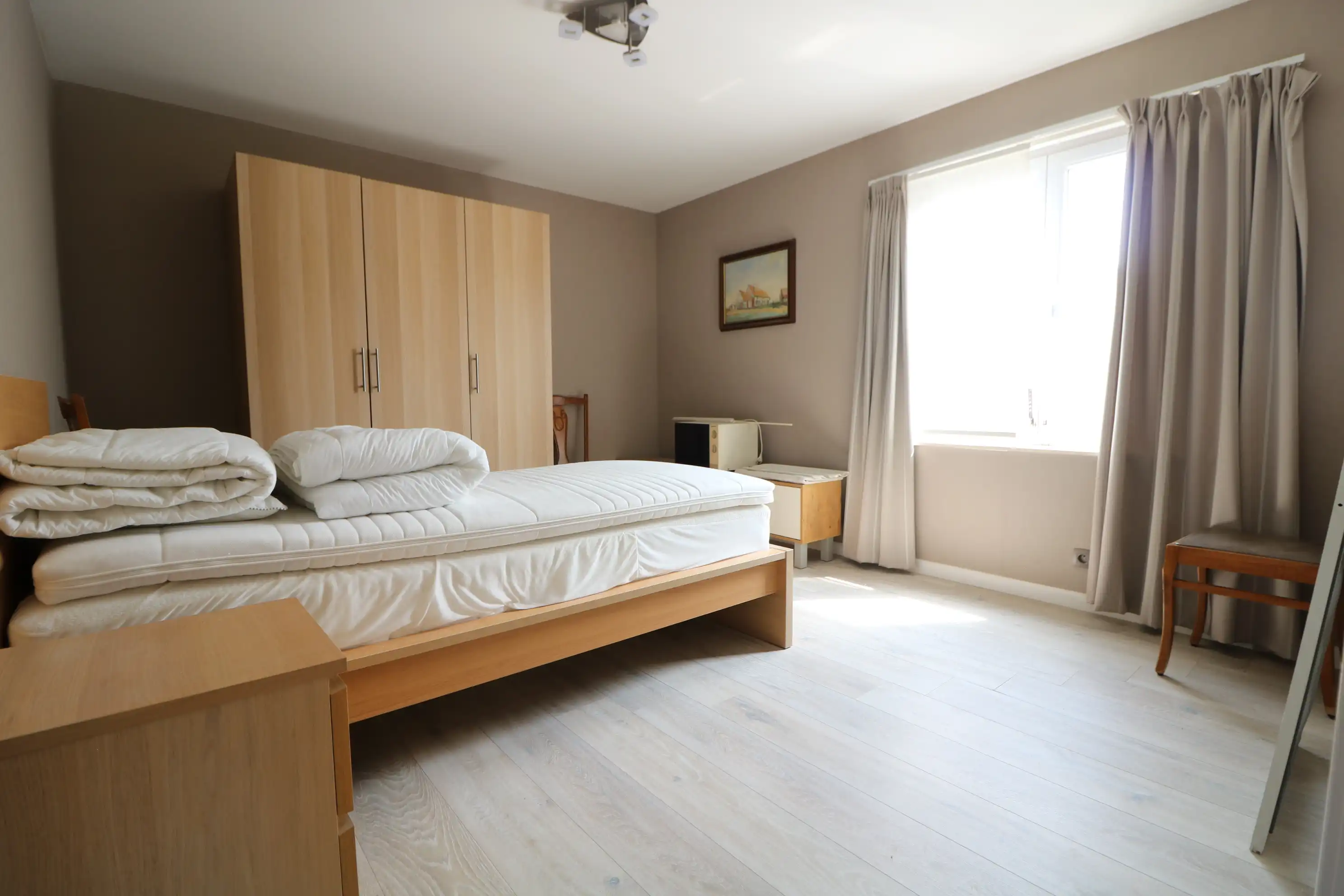 Ruim en lichtrijk hoekappartement met 2 slaapkamers, terras én garage foto 11