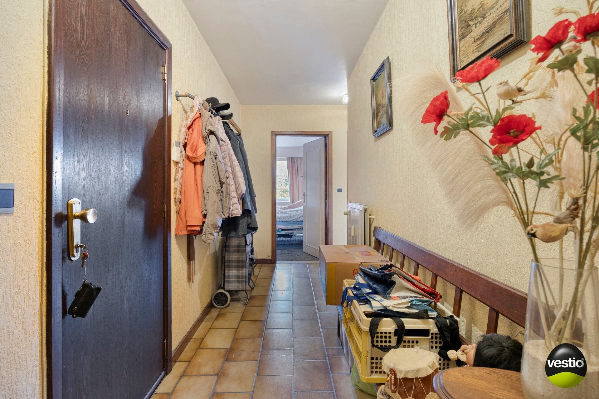 Te renoveren 2-slaapkamerappartement met terras, garagebox en kelder. foto 6