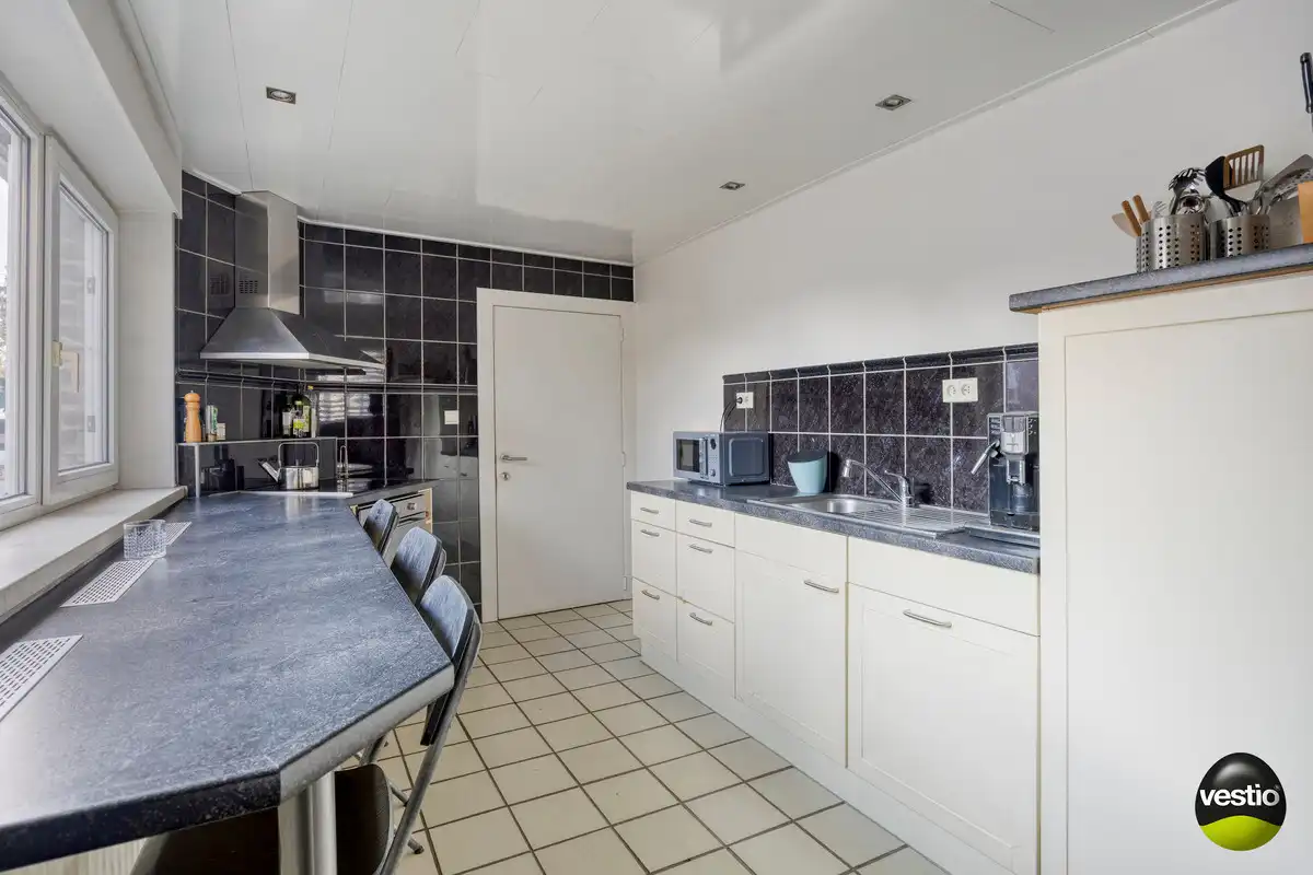 HOEVEWONING OP 26A85CA IN STADSRAND BILZEN. foto 9