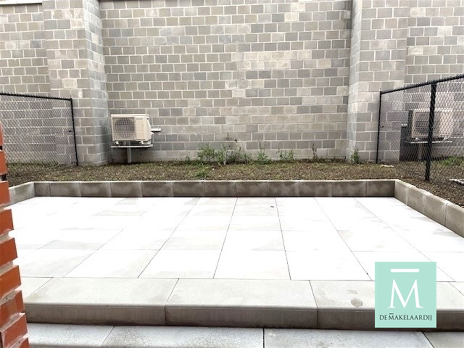 Gelijkvloers nieuwbouwappartement met 2 slaapkamers, terras/tuin op toplocatie! foto 10