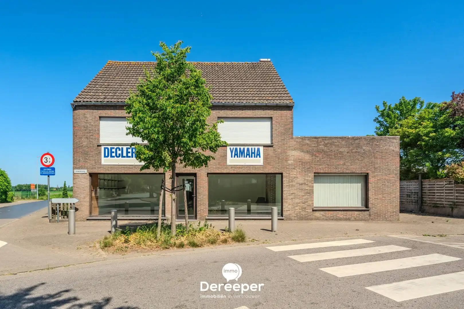Commercieel pand met showroom, atelier, opslagplaatsen en woonst op toplocatie foto 4