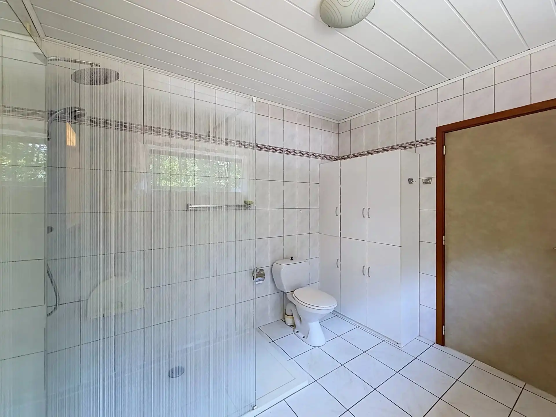 Op te knappen woning met veel mogelijkheden op een mooi perceel. foto 15
