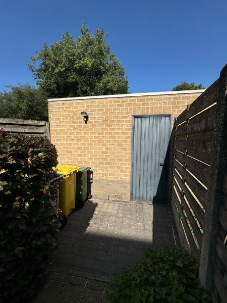 Modern gelijkvloers appartement met tuin, 2 slaapkamers en garage! foto 18