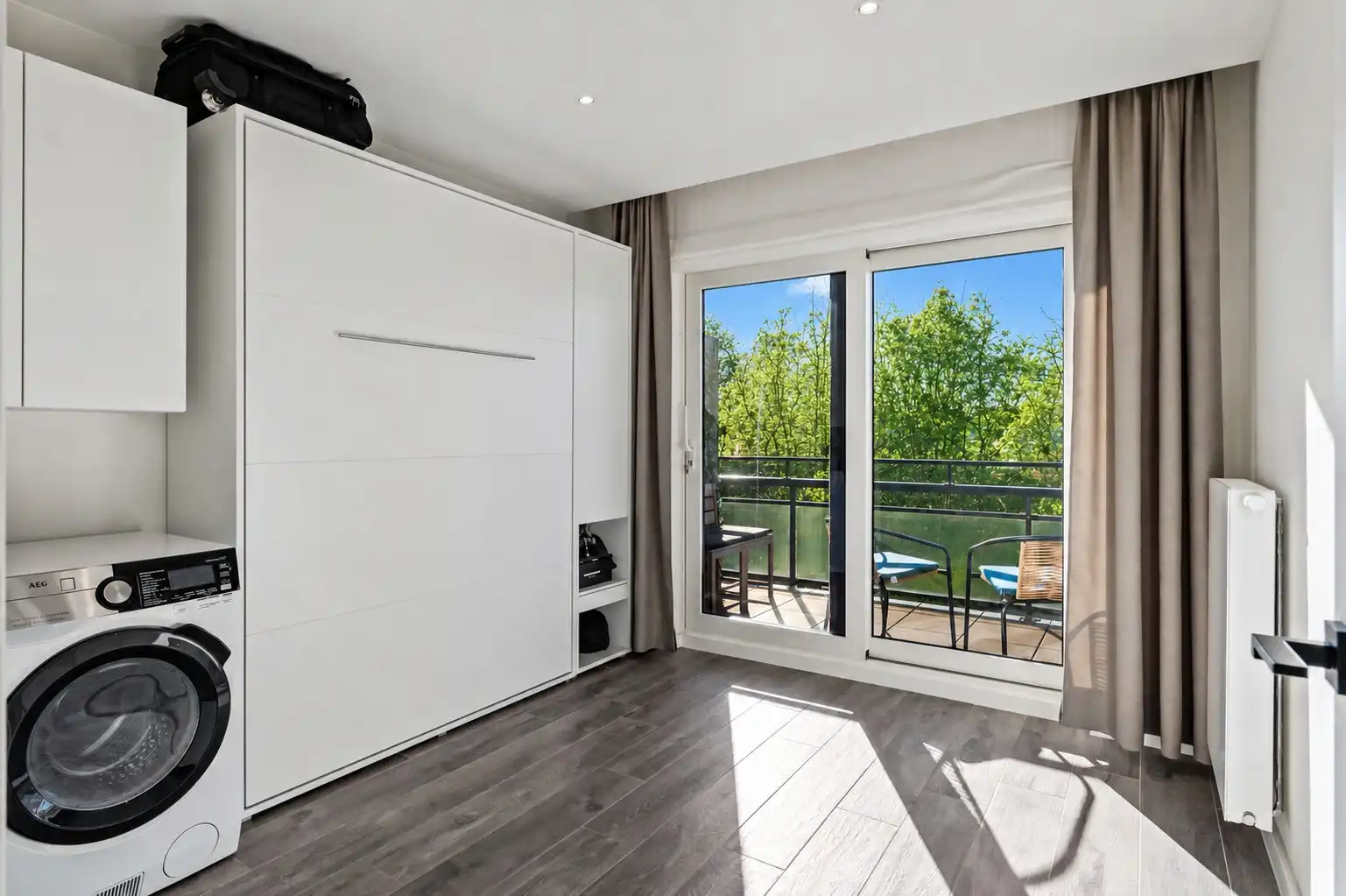 Prachtig gerenoveerd appartement met garage foto 12