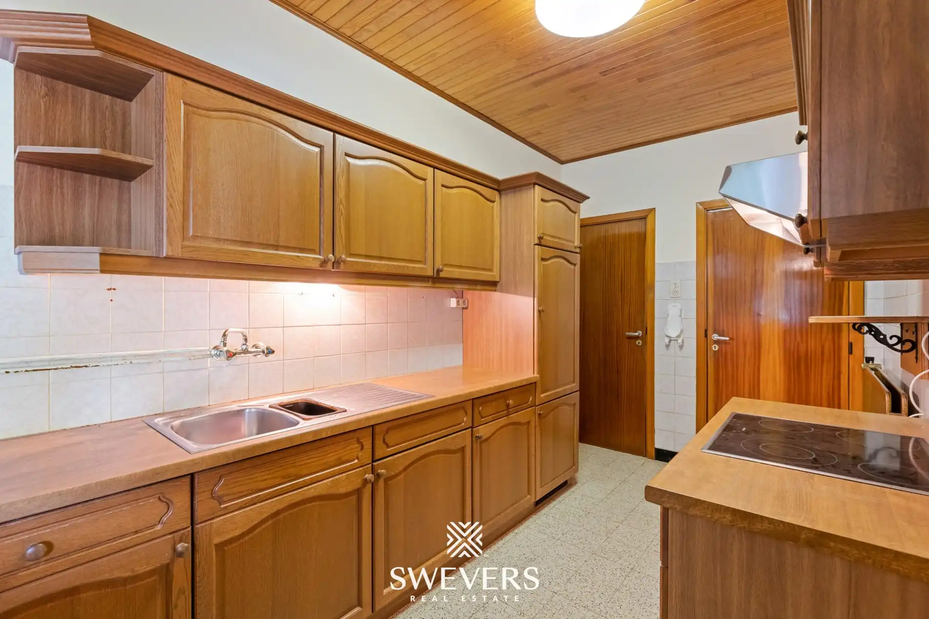 Halfopen bebouwing met renovatiepotentieel en drie slaapkamers te Paal foto 7