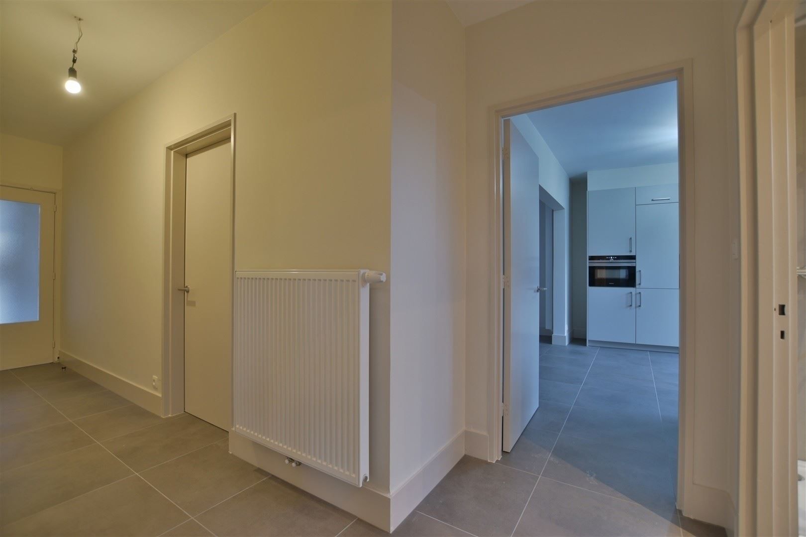 Totaal gerenoveerd GV appartement met tuin te Grembergen foto 18