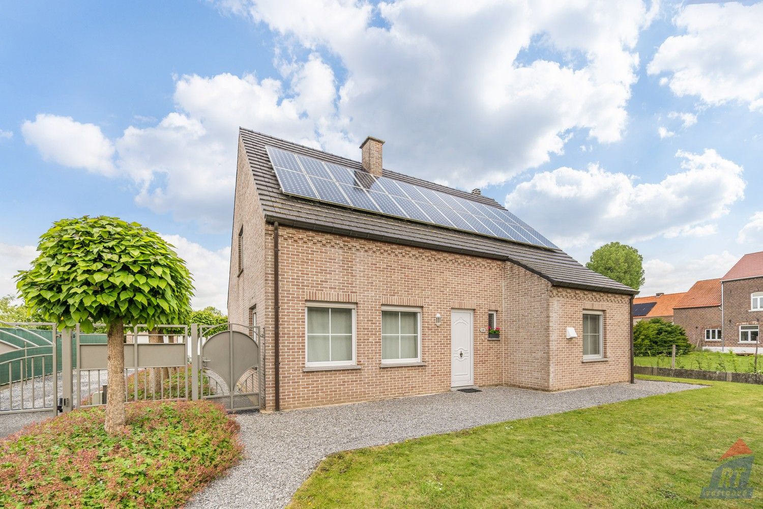 Instapklare open bebouwing met 4 slaapkamers, ruime tuin en dubbele garage in het groene Sint-Truiden