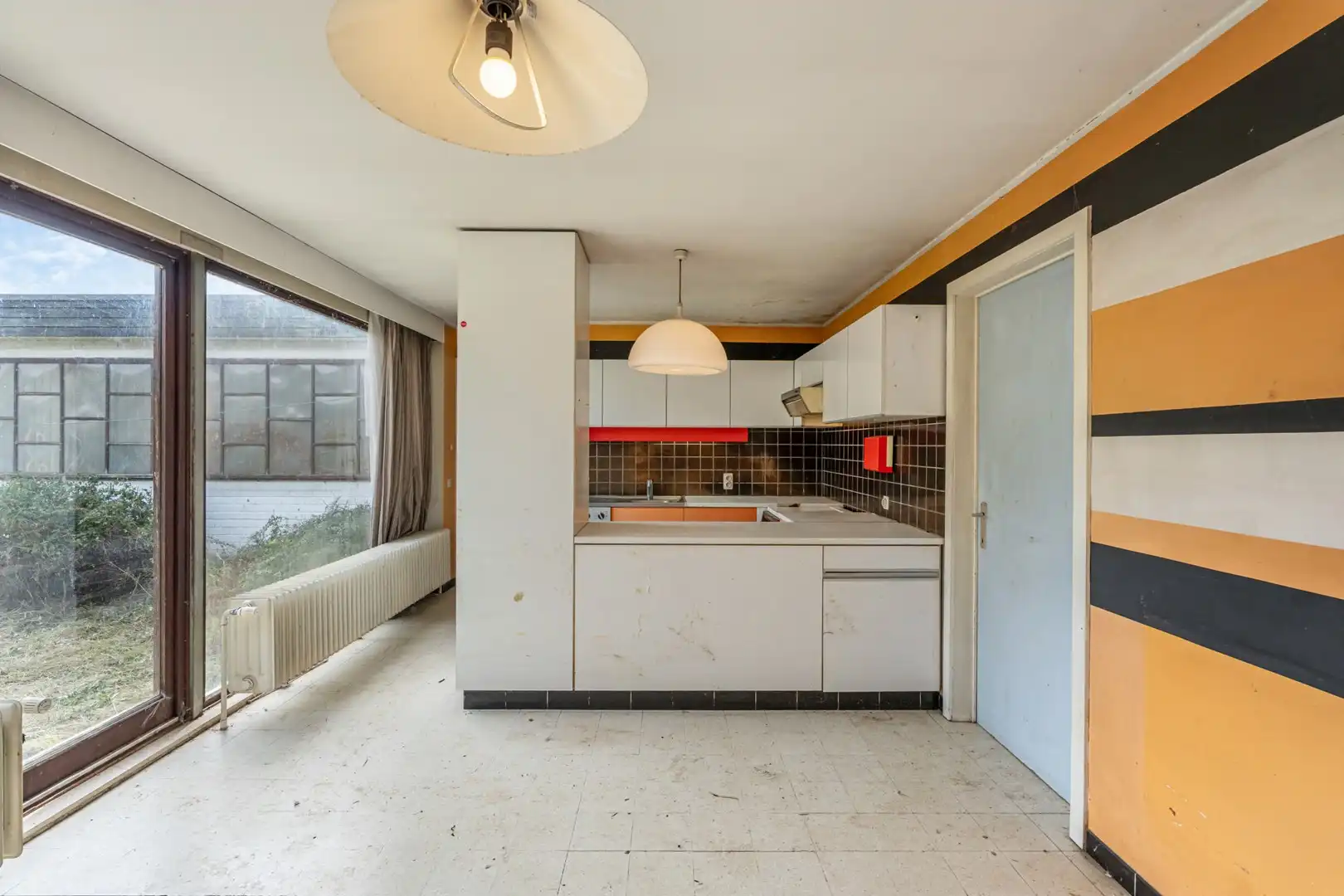 Karaktervolle patio-bungalow met renovatiepotentieel in doodlopende straat te Herent foto 5