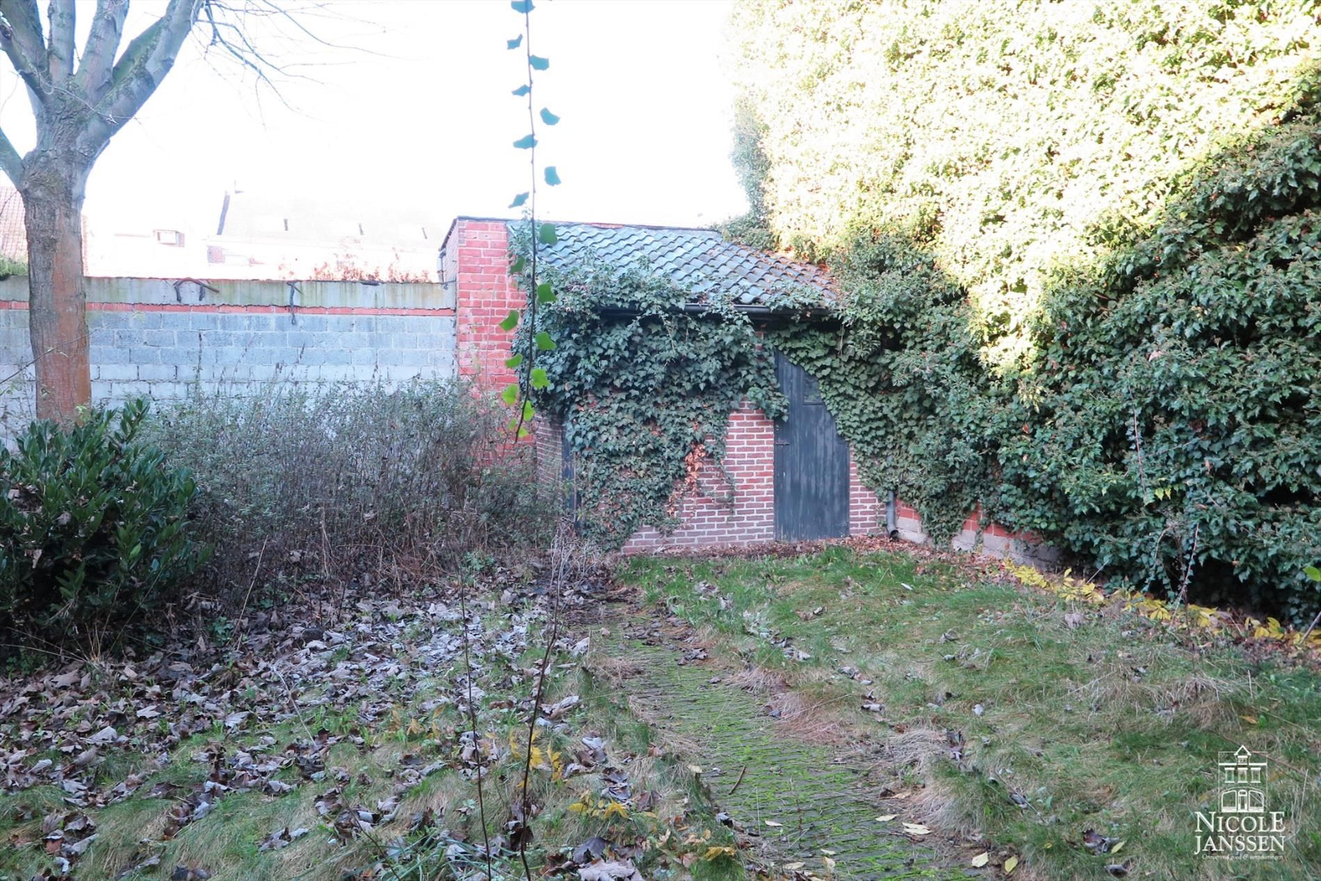 Gerenoveerde, authentieke stadsboerderij met tuin in het hartje van Maaseik foto 32