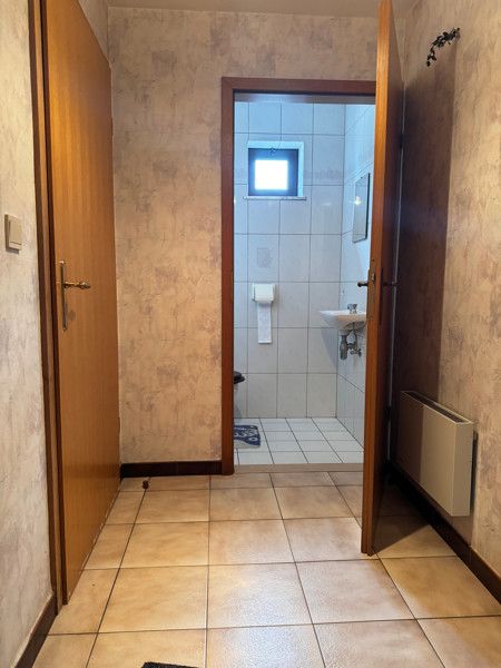 Gelijkvloers appartement met 2 slpkms, autostaanplaats en private berging foto 14