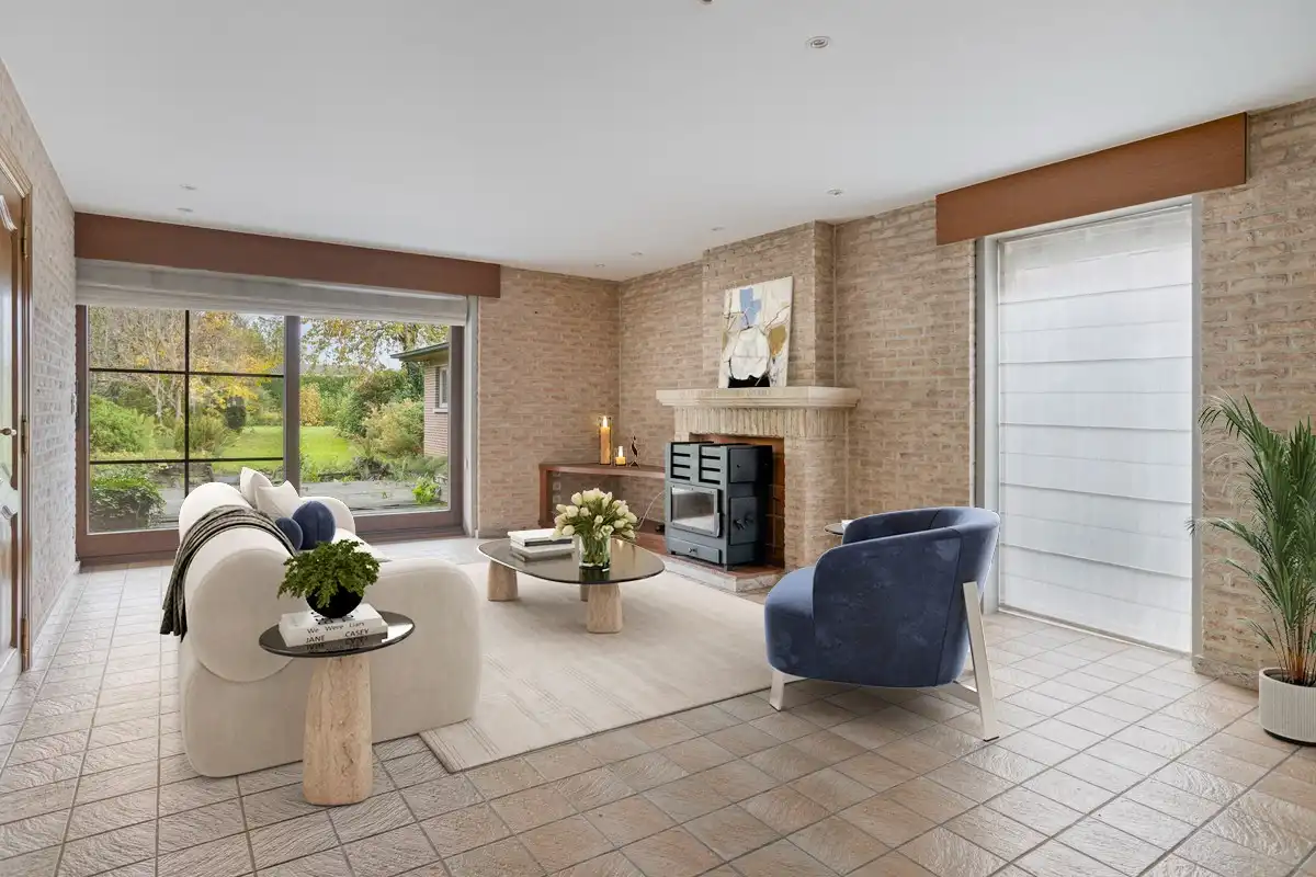 Bijzonder ruime woning met inpandige garage en 3 slks op een perceel van 1218 m². foto 2