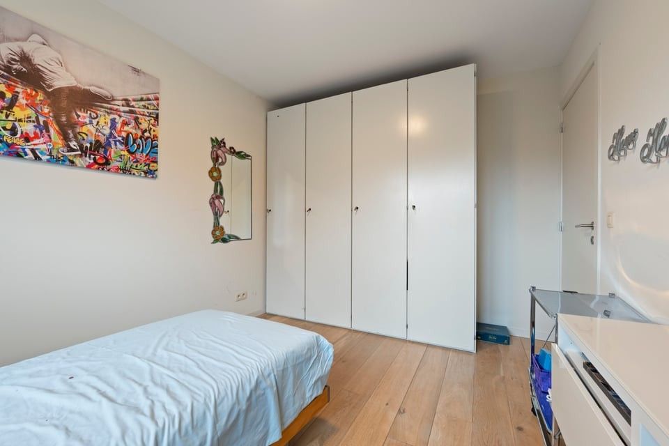 MODERN GELIJKVLOERS APPARTEMENT MET TERRAS EN STAANPLAATS IN SINT-TRUIDEN foto 22