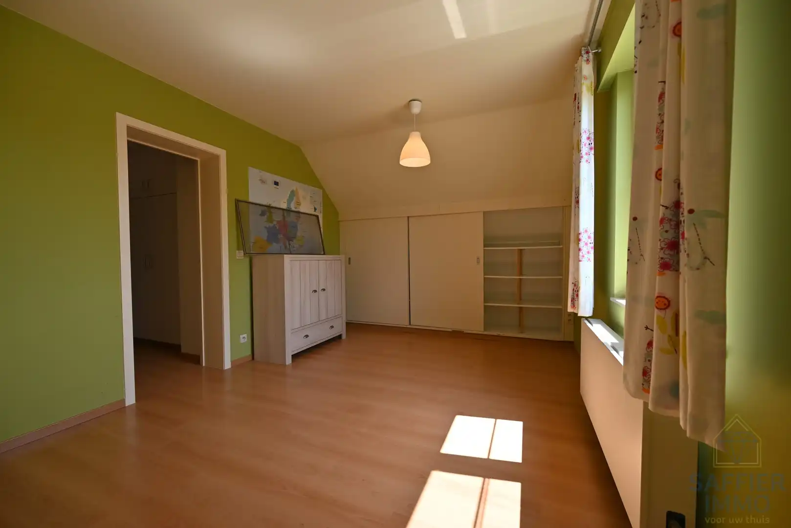 Te huur – Ruime gezinswoning met zonnige tuin in het hart van Ingelmunster foto 11